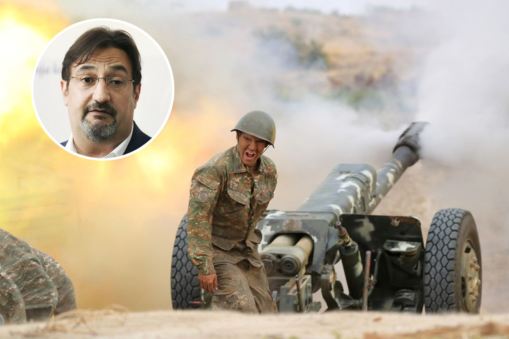 An ethnic Armenian soldier fires an artillery piece during fighting with Azerbaijan's forces in Nagorno-Karabakh