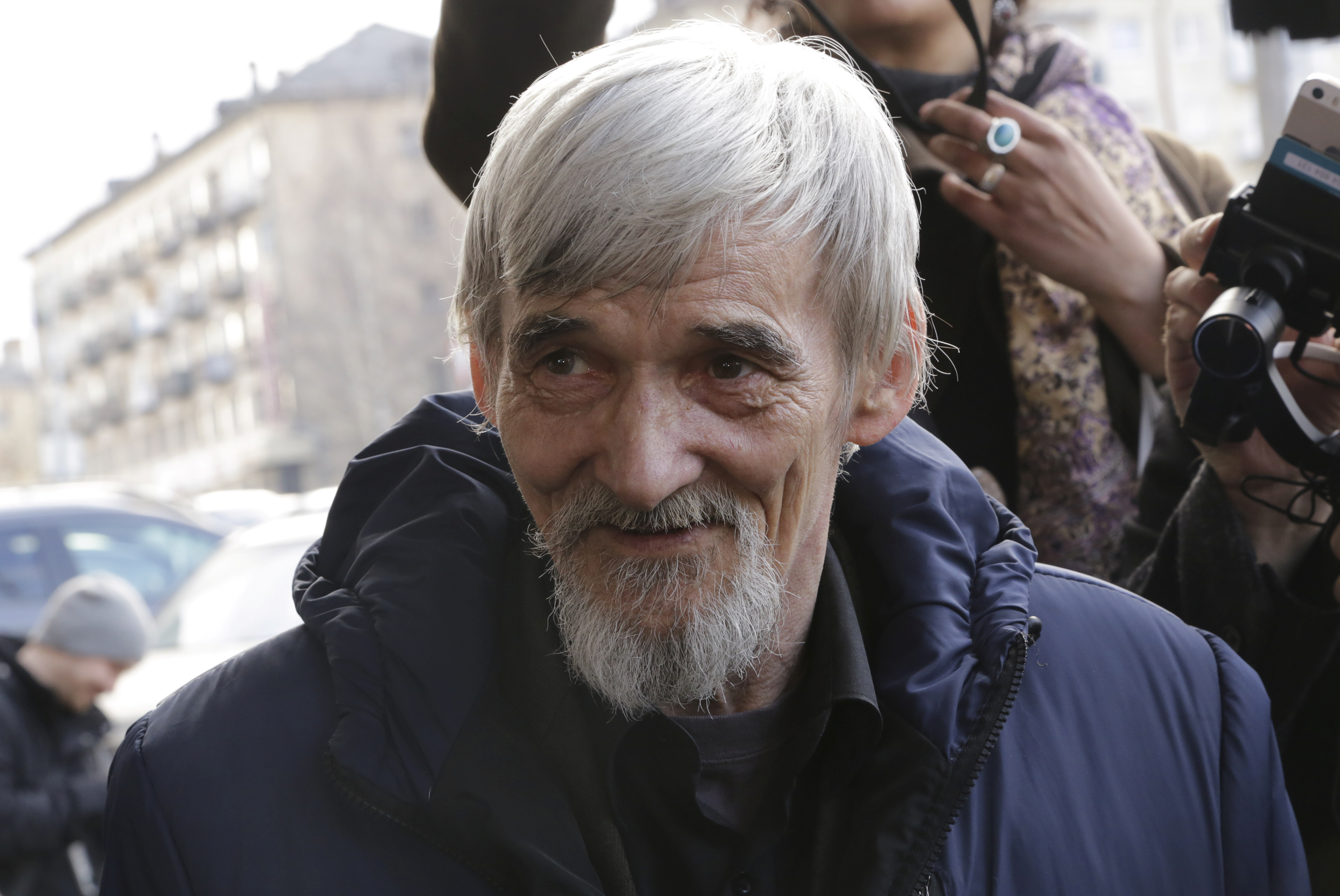 jurij dmitrijev FILE PHOTO: Historian Yuri Dmitriev speaks with people outside a court building in Petrozavodsk