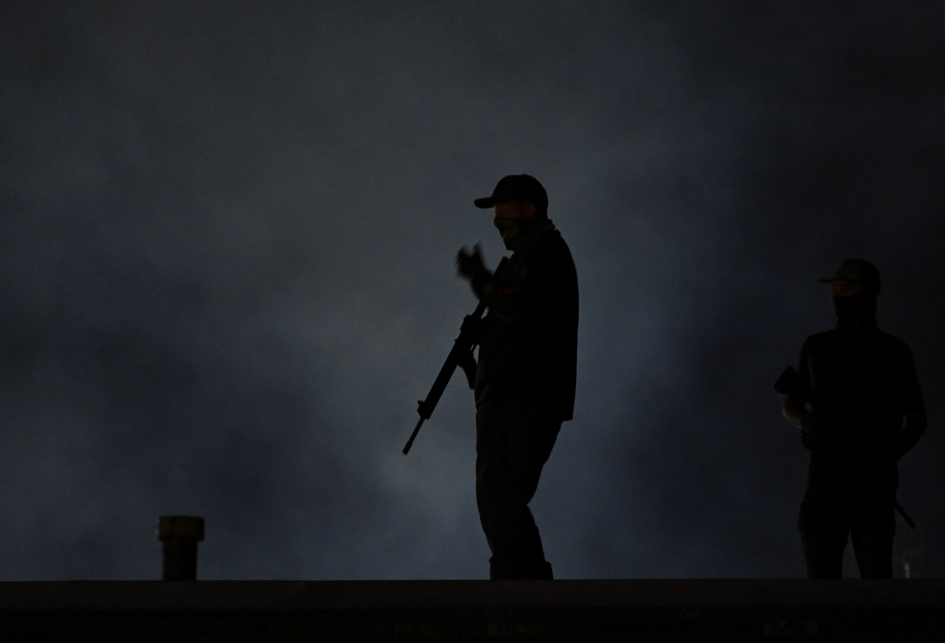People protest after a Black man identified as Jacob Blake was shot several times by police in Kenosha