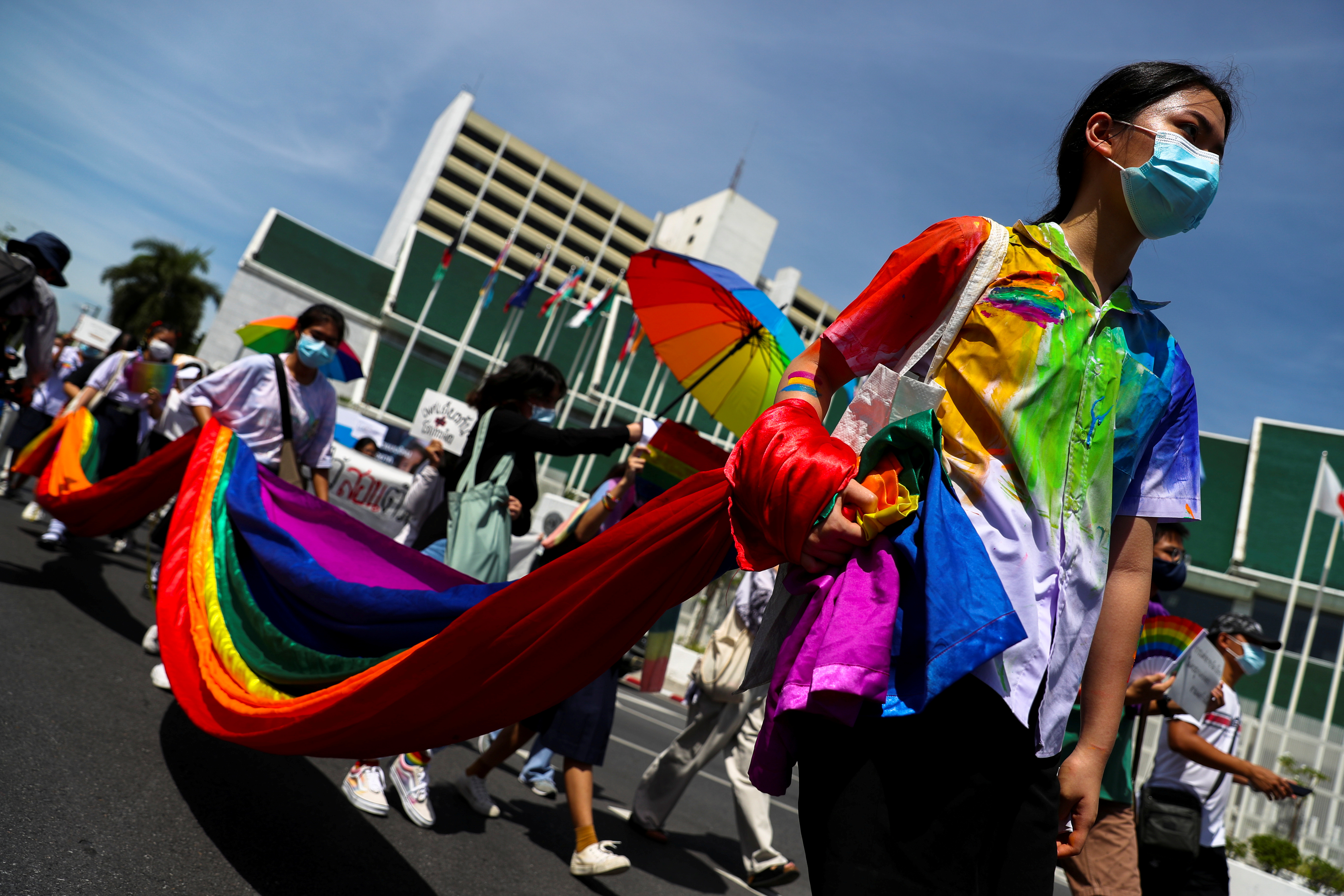 Members of a youth pride student group hold an LGBT flag during a rally for gender rights in Bangkok, Thailand July 29, 2020. REUTERS/Athit Perawongmetha     TPX IMAGES OF THE DAY