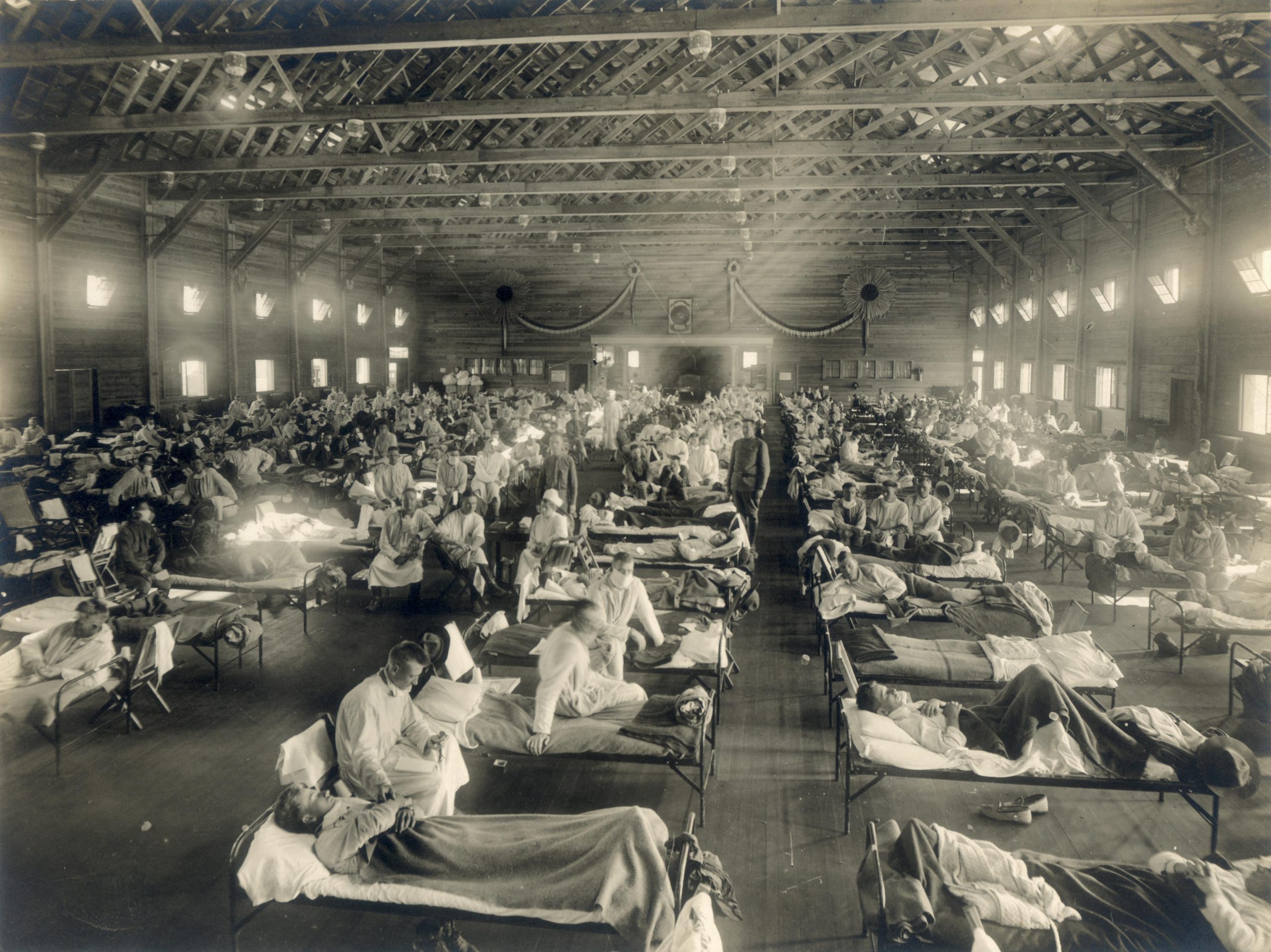 Emergency_hospital_during_Influenza_epidemic_Camp_Funston_Kansas_-_NCP_1603-scaled.jpg