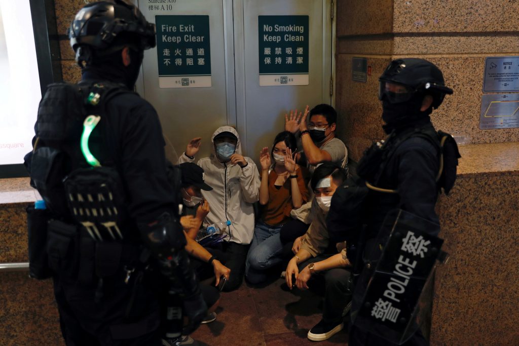 People detained by riot police during a march against national security law at the anniversary of Hong Kong's handover to China from Britain in Hong Kong, China July 1, 2020. REUTERS/Tyrone Siu     TPX IMAGES OF THE DAY