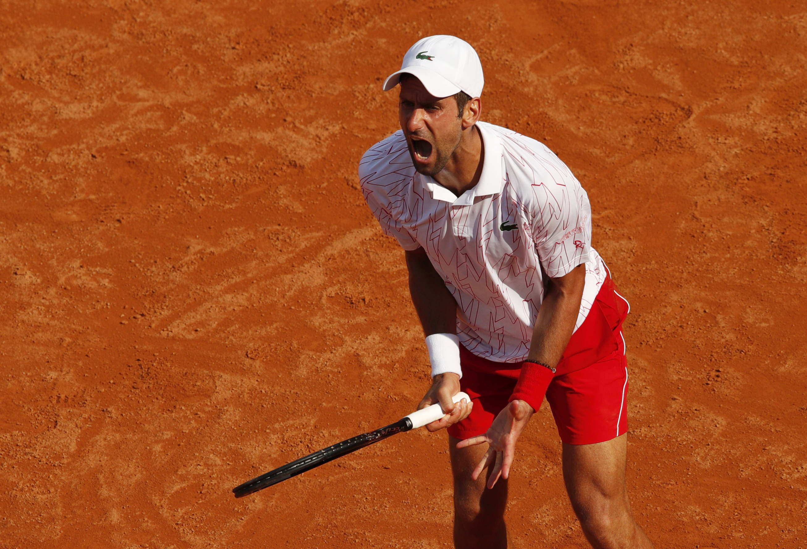 Tennis - ATP Masters 1000 - Italian Open - Foro Italico, Rome, Italy - September 20, 2020 Serbia's Novak Djokovic reacts during his semi final match against Norway's Casper Ruud Pool via REUTERS/Clive Brunskill