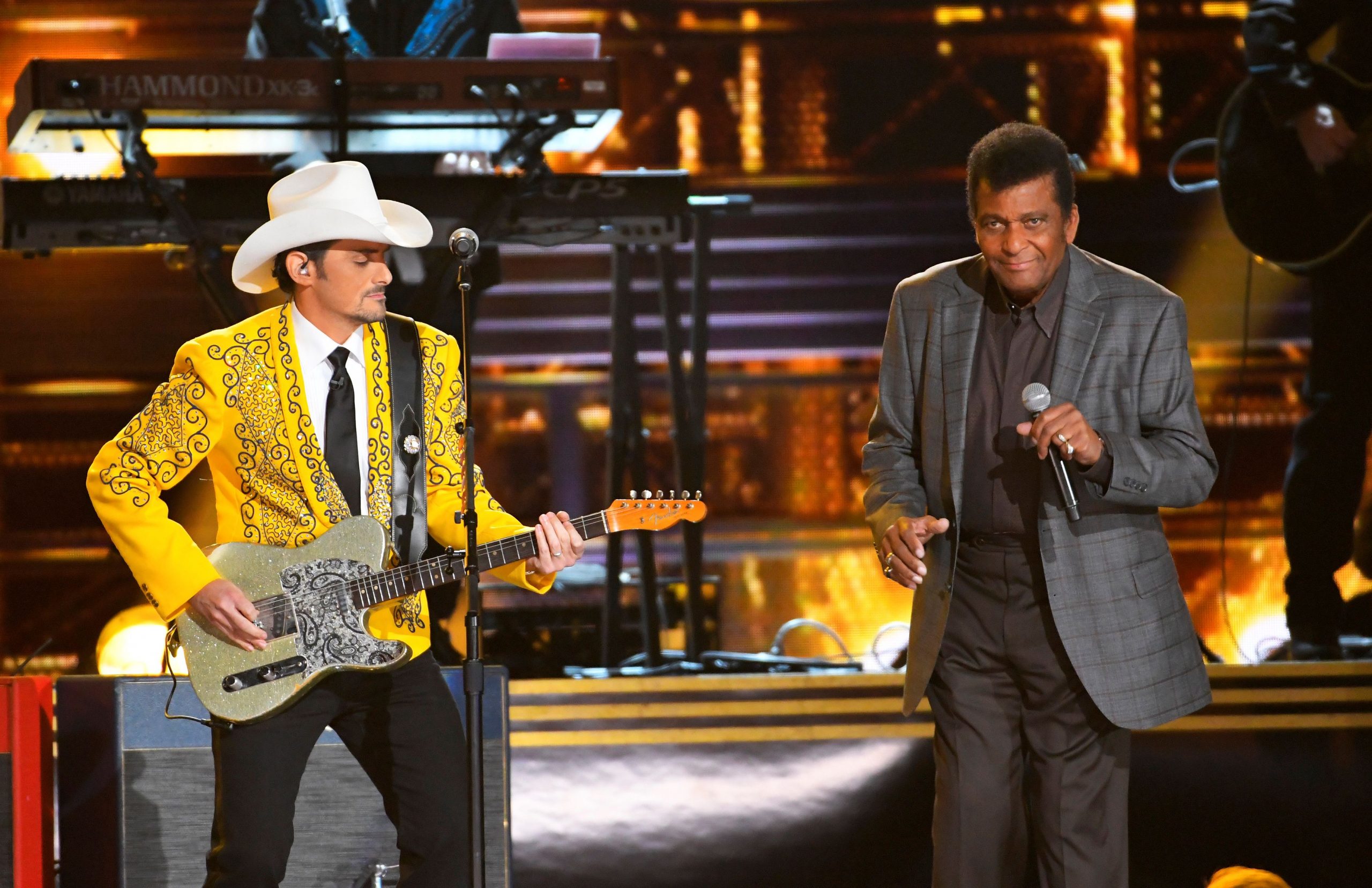 FILE PHOTO: Singers Brad Paisley and Charley Pride perform "Kiss an Angel Good Morning" on stage during the 50th Annual Country Music Association Awards in Nashville, Tennessee, U.S., November 2, 2016.  REUTERS/Harrison McClary/File Photo