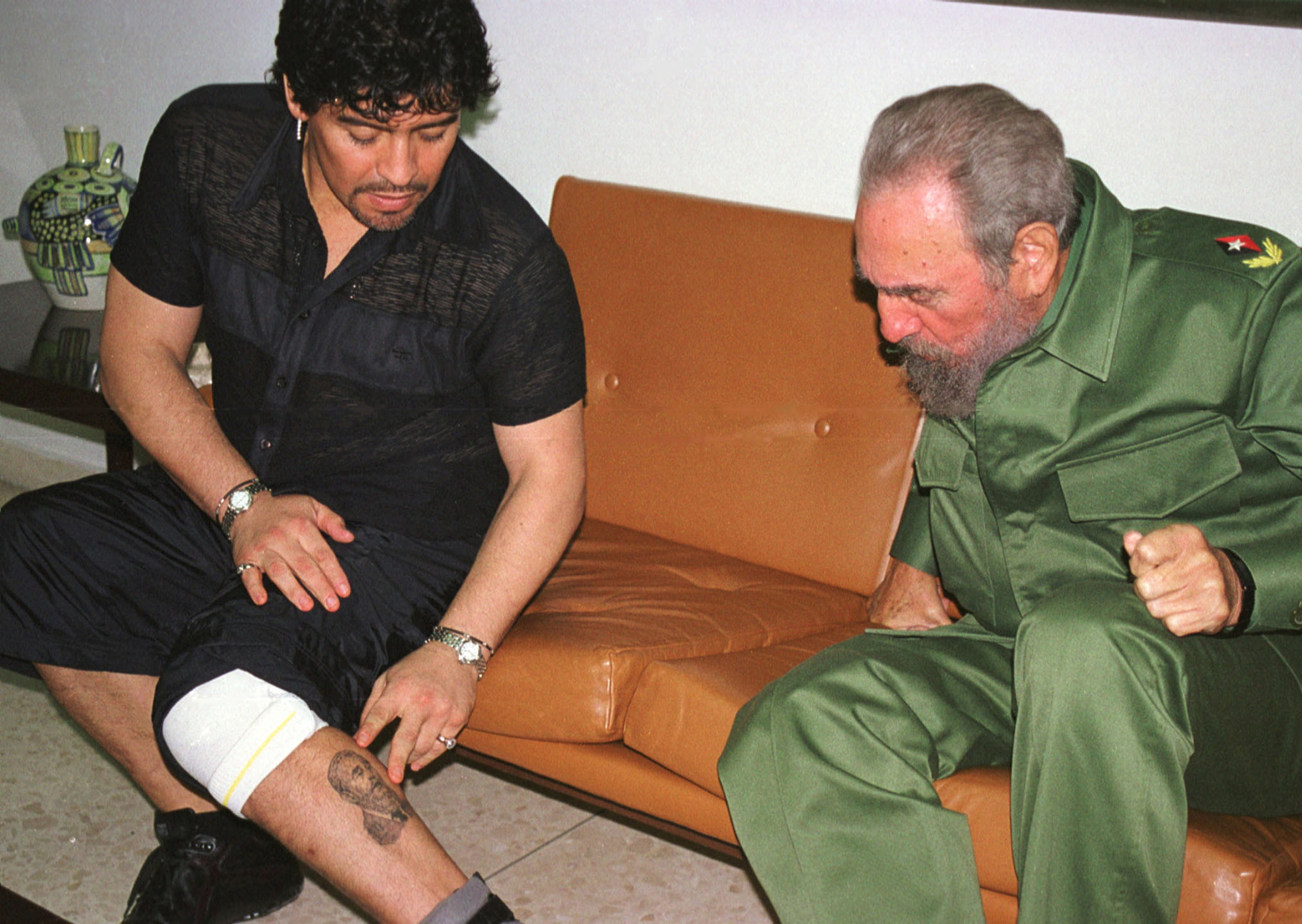 FILE PHOTO: Argentine legend Maradona meeting with Fidel Castro