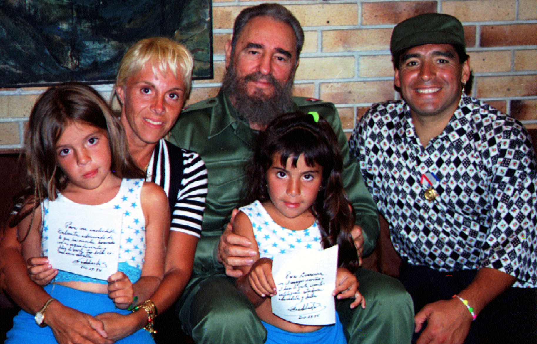 FILE PHOTO: Cuban President Fidel Castro poses with Argentine soccer star Diego Maradona