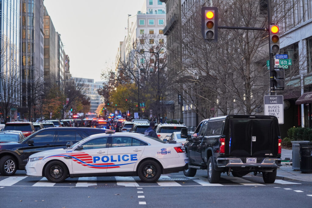 Streets are blocked after reports of two National Guard soldiers were shot near the White House in Washington, Wednesday, Nov. 26, 2025. (AP Photo/Evan Vucci)