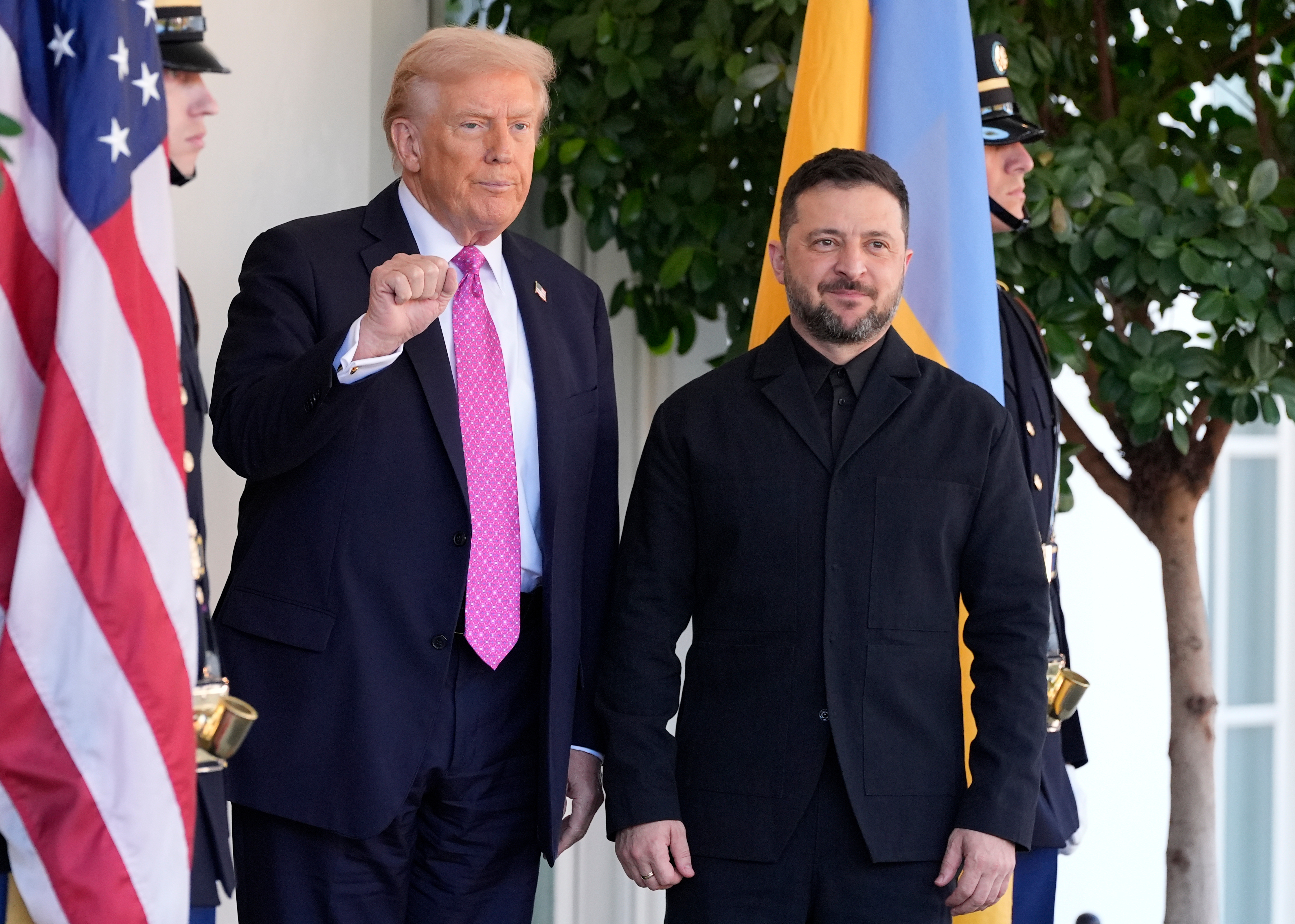 President Donald Trump, left, gestures as he greets Ukraine's President Volodymyr Zelenskyy at the White House, Friday, Oct. 17, 2025, in Washington. (AP Photo/Alex Brandon)