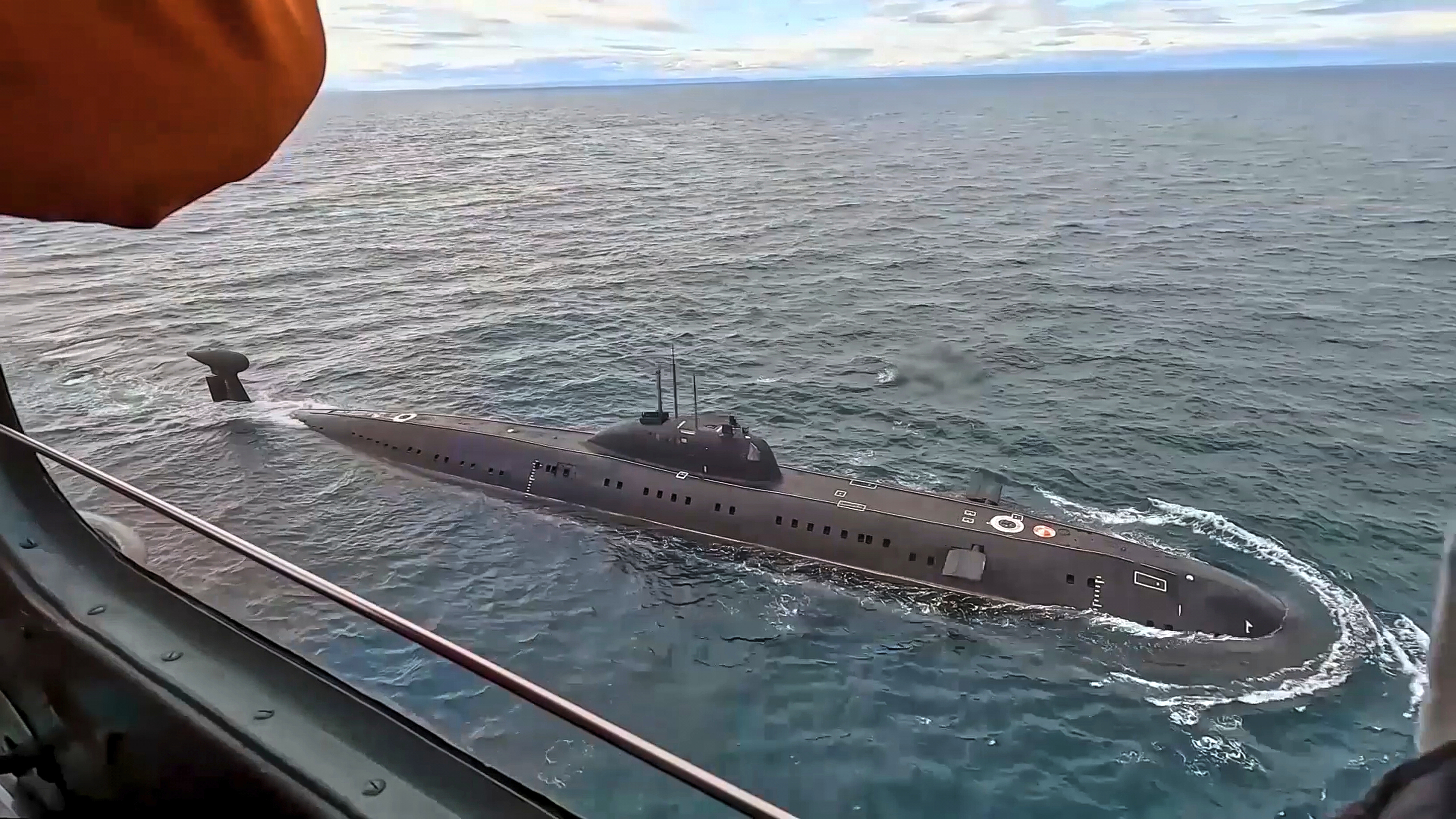 In this photo taken from video distributed by Russian Defense Ministry Press Service on Monday, Sept. 15, 2025, a Russian nuclear submarine is seen during drills in the Barents Sea. (Russian Defense Ministry Press Service via AP)