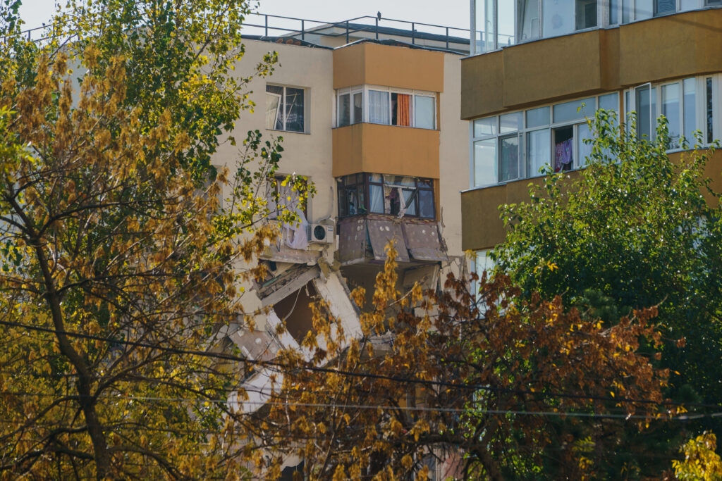 A view of of a damaged apartment building after a powerful explosion in a residential block in Bucharest, Romania, Friday, Oct. 17, 2025. (AP Photo)