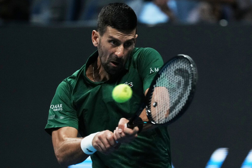 Novak Djokovic of Serbia plays a shot against Yannick Hanfmann of Germany during the ATP250 tournament semifinal tennis match, in Athens, Greece, Friday, Nov. 7, 2025. (AP Photo/Thanassis Stavrakis)