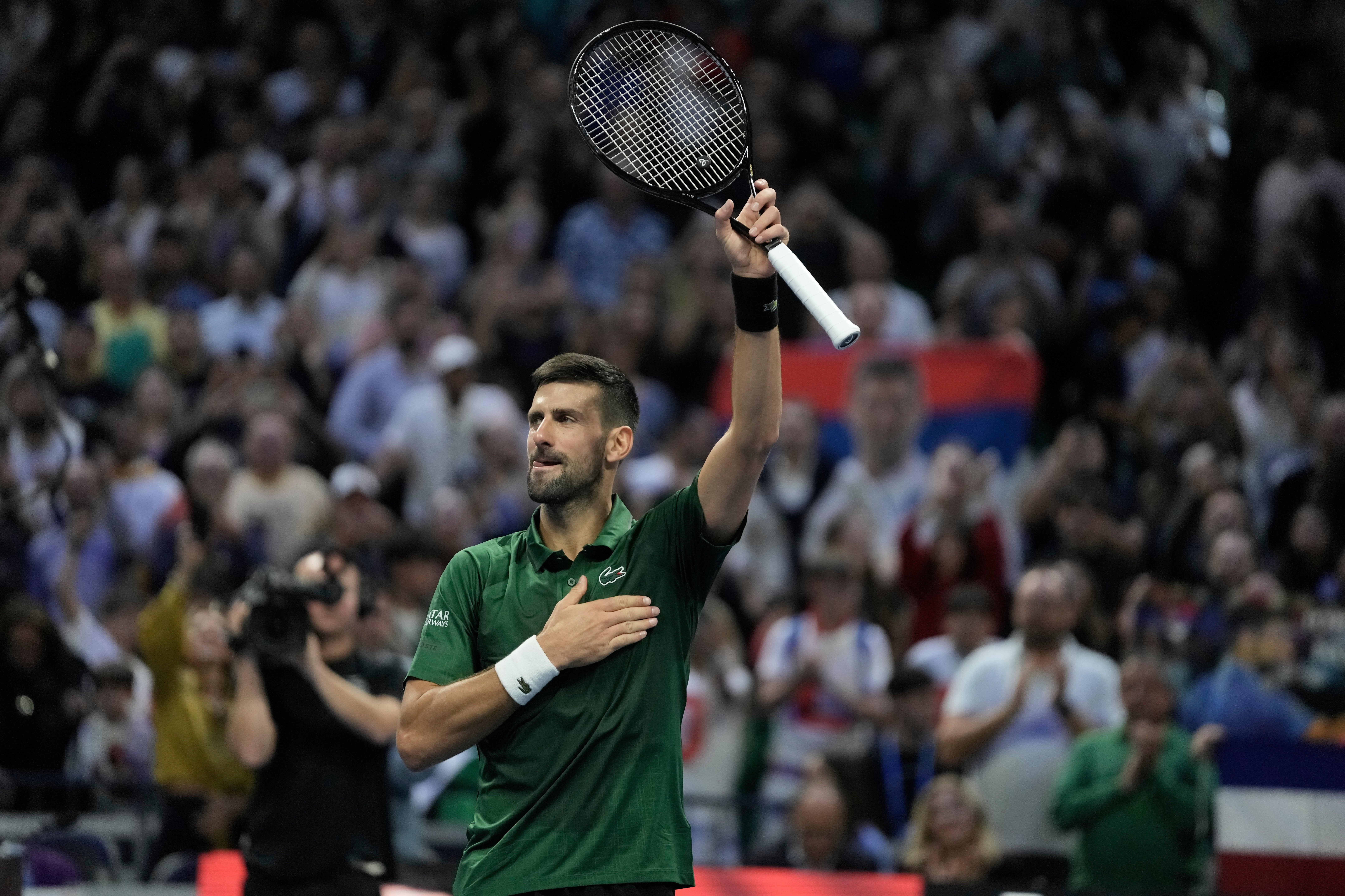 Novak Djokovic of Serbia celebrates after his win against Yannick Hanfmann of Germany during the ATP250 tennis tournament, in Athens, Greece, Friday, Nov. 7, 2025. (AP Photo/Thanassis Stavrakis)