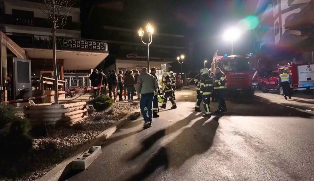 Rescue staffers and firefighters in the area where a fire broke out leaving people dead and injured, during New Year’s celebration, in Crans-Montana, Swiss Alps, Switzerland, Thursday, Jan. 1, 2026. (Police Cantonale Valaisanne via AP)