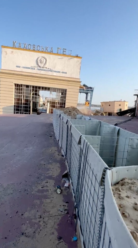 Damaged buildings are seen as the Nova Kakhovka dam was breached in Kherson region, Ukraine June 6, 2023 in this screen grab taken from a video obtained by Reuters/via REUTERS    THIS IMAGE HAS BEEN SUPPLIED BY A THIRD PARTY. NO RESALES. NO ARCHIVES.