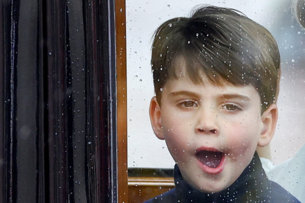 Britain's Prince Louis yawns as he travels in a coach, following Britain's King Charles' coronation ceremony, near Buckingham Palace, in London, Britain May 6, 2023.  REUTERS/Hannah McKay      TPX IMAGES OF THE DAY