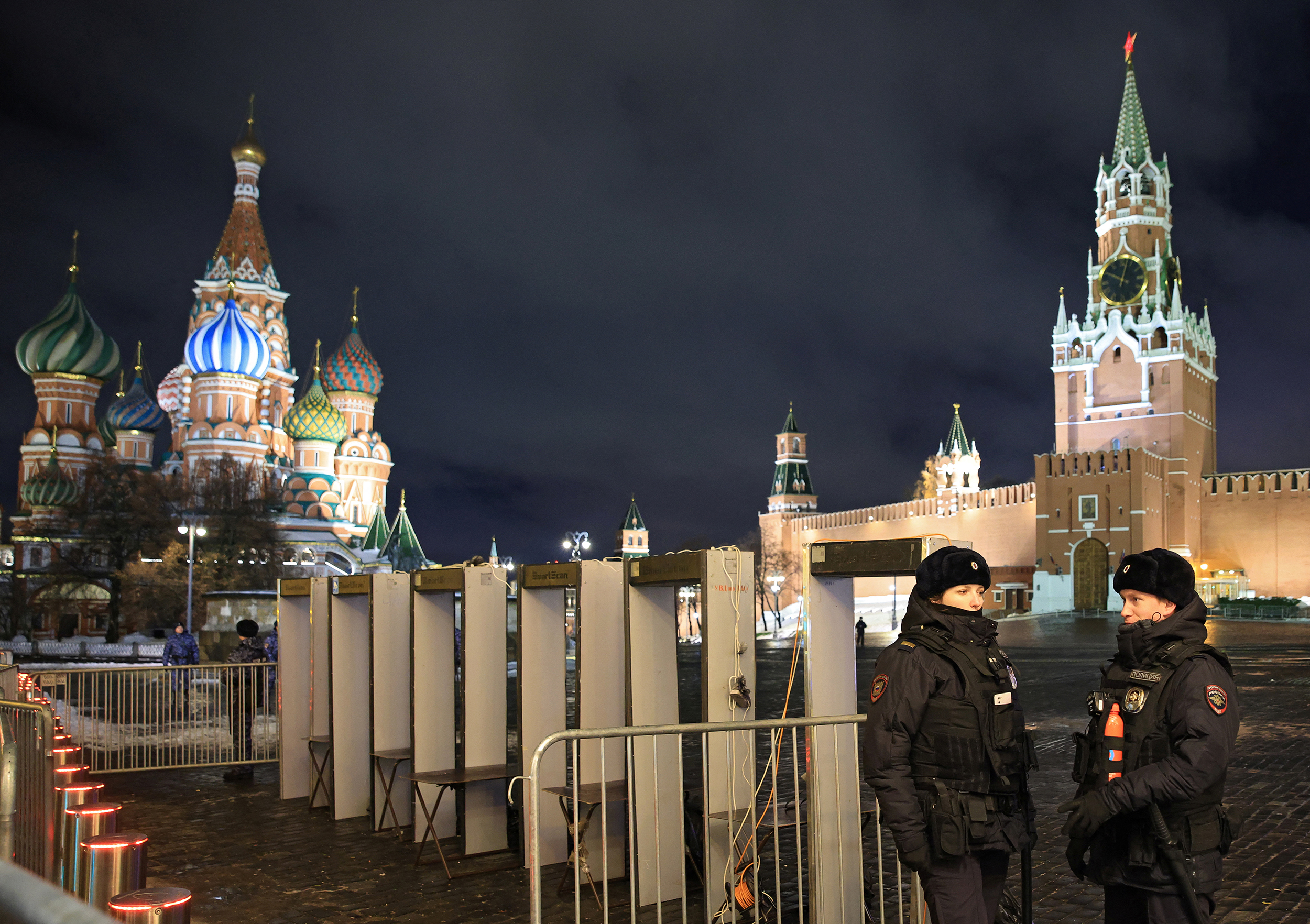 Russian law enforcement officers stand guard at Red Square, closed during New Year's Eve celebrations, in Moscow, Russia December 31, 2022. REUTERS/Tatyana Makeyeva