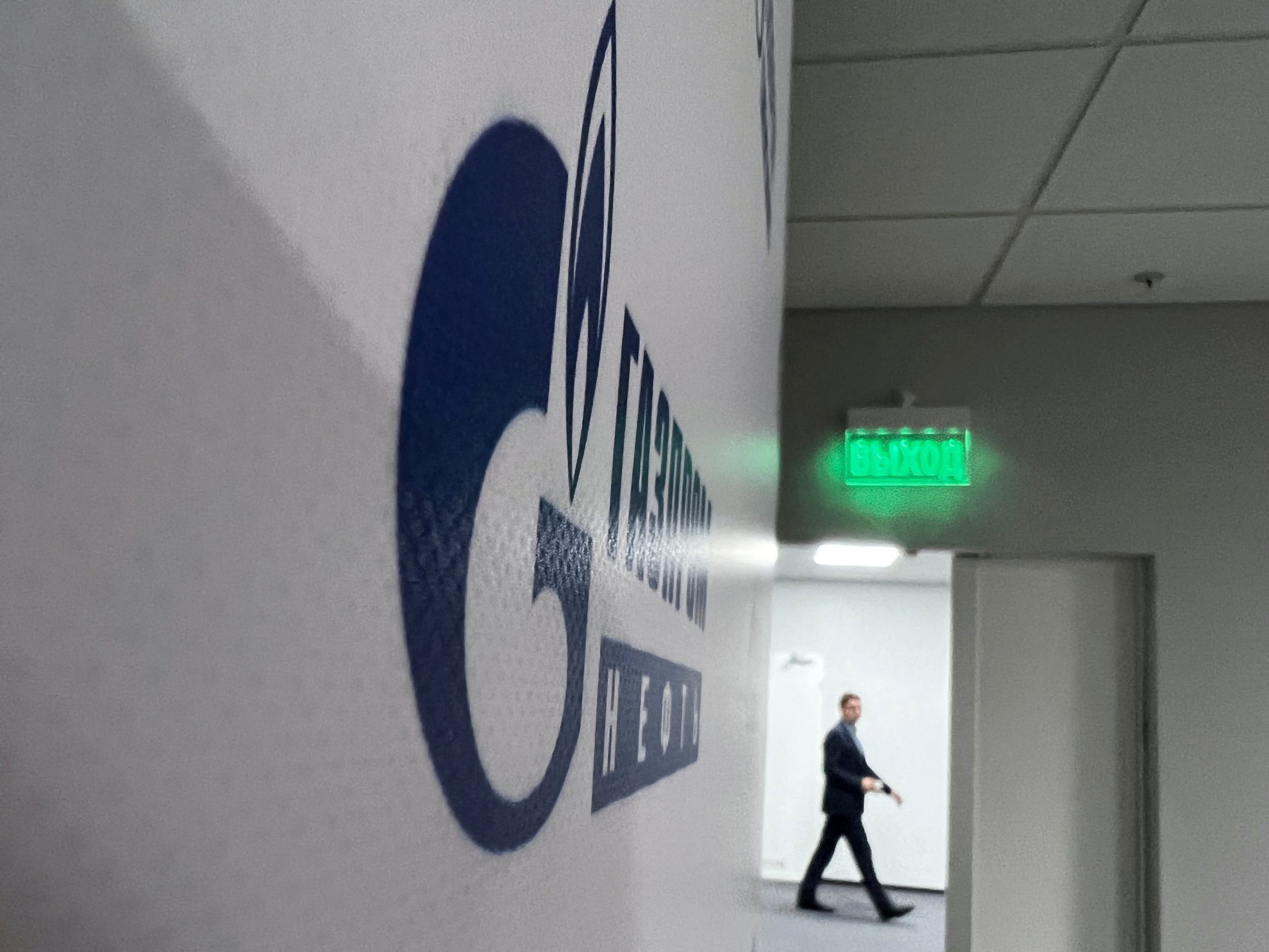 An employee walks at the office of Gazprom Neft company in Khanty-Mansiysk, Russia August 30, 2022. REUTERS/Olesya Astakhova