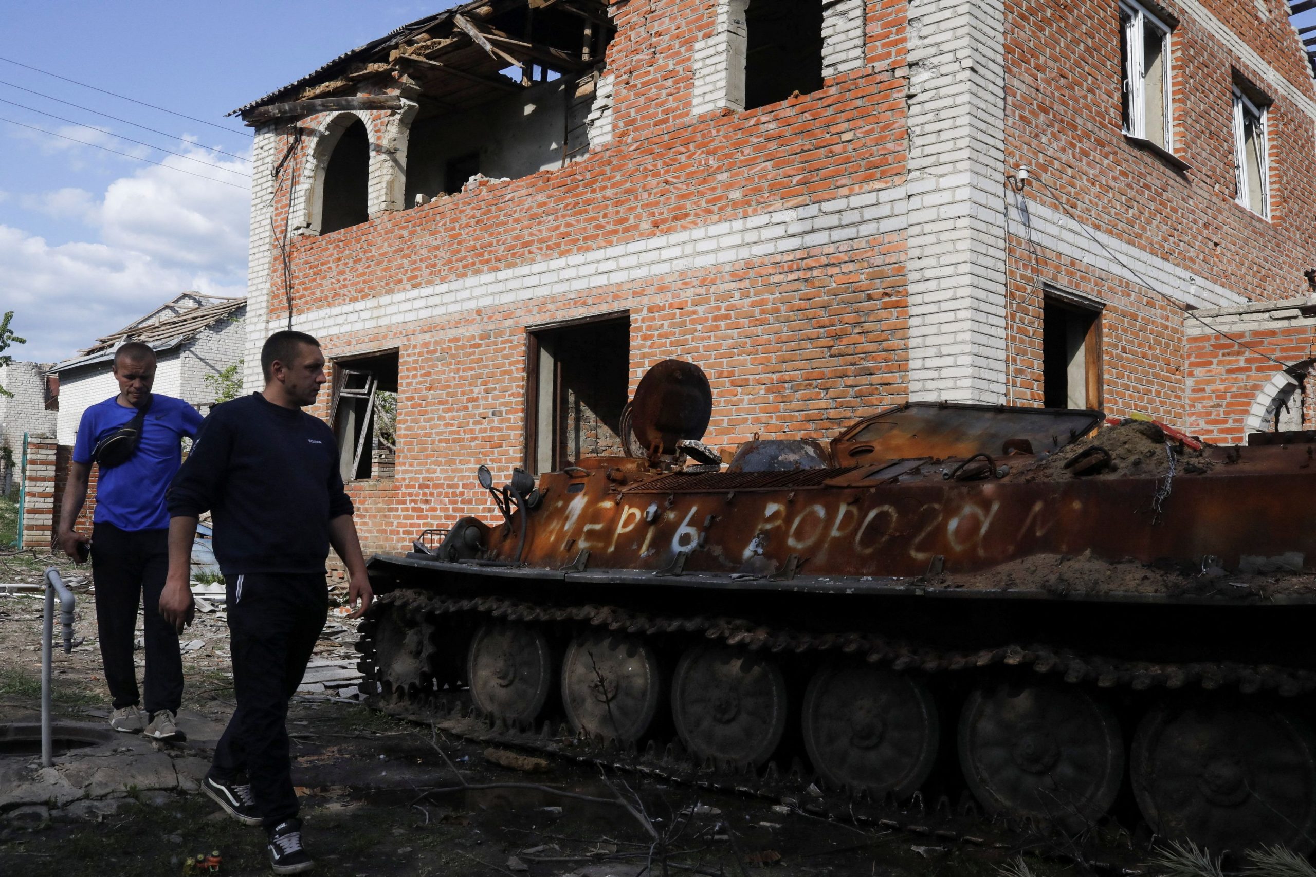 Vladimir visits his damaged house where a destroyed Russian combat vehicle is parked in Malaya Rohan, a village retaken by the Ukrainian forces, amid Russia's attack on Ukraine, in Kharkiv region, Ukraine, May 19, 2022. REUTERS/Ricardo Moraes