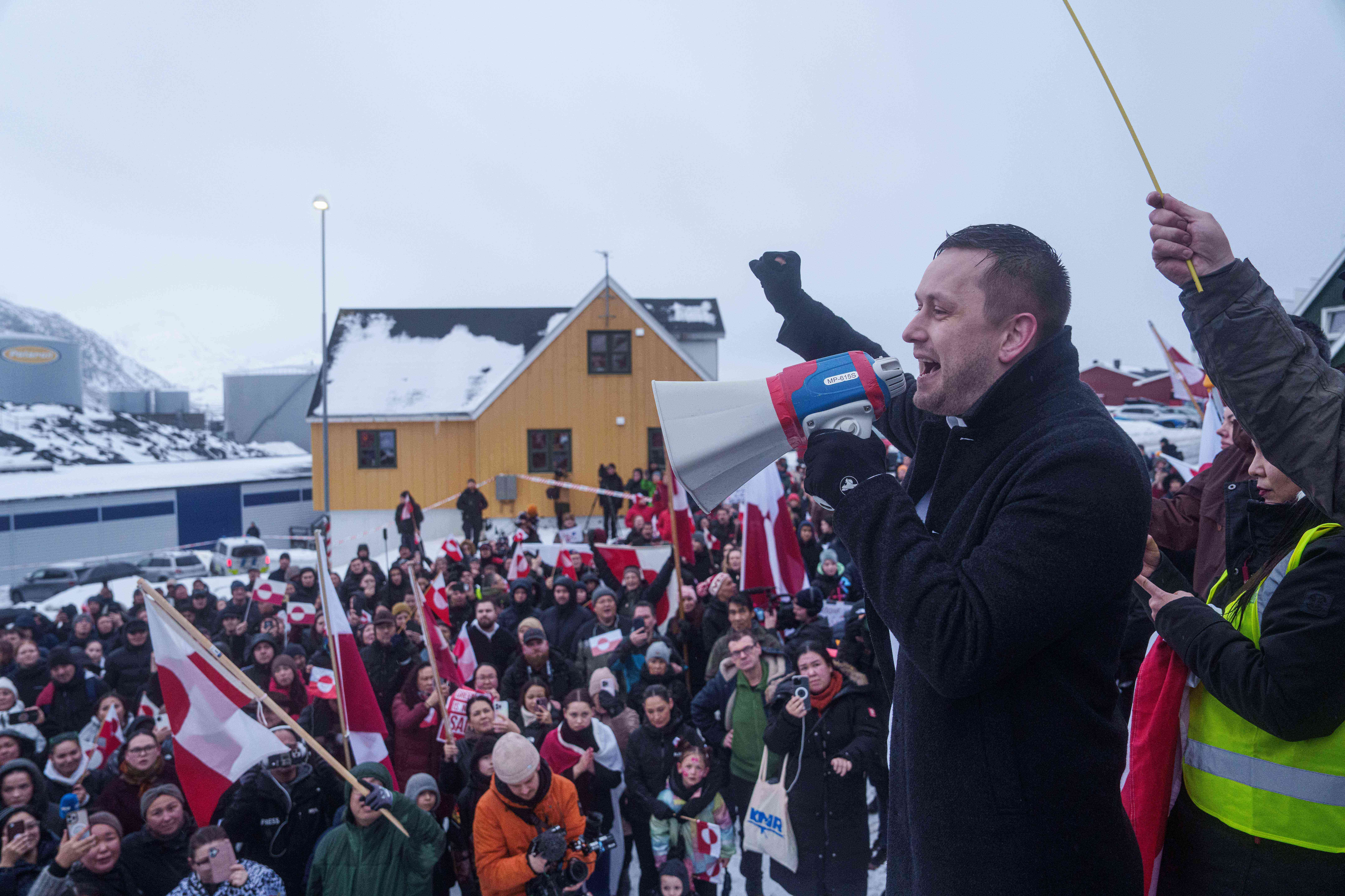 Greenlandic Prime Minister Jens-Frederik Nielsen speaks during a protest against Trump's policy towards Greenland in front of the US consulate in Nuuk, Greenland, Saturday, Jan. 17, 2026. (AP Photo/Evgeniy Maloletka)