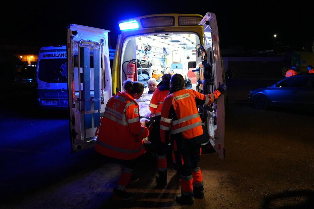 An injured person is transported by ambulance in Adamuz, near Córdoba, southern Spain, Monday, Jan. 19, 2026, after a high-speed train derailed and collided with another train. (Francisco J. Olmo/Europa Press via AP)
