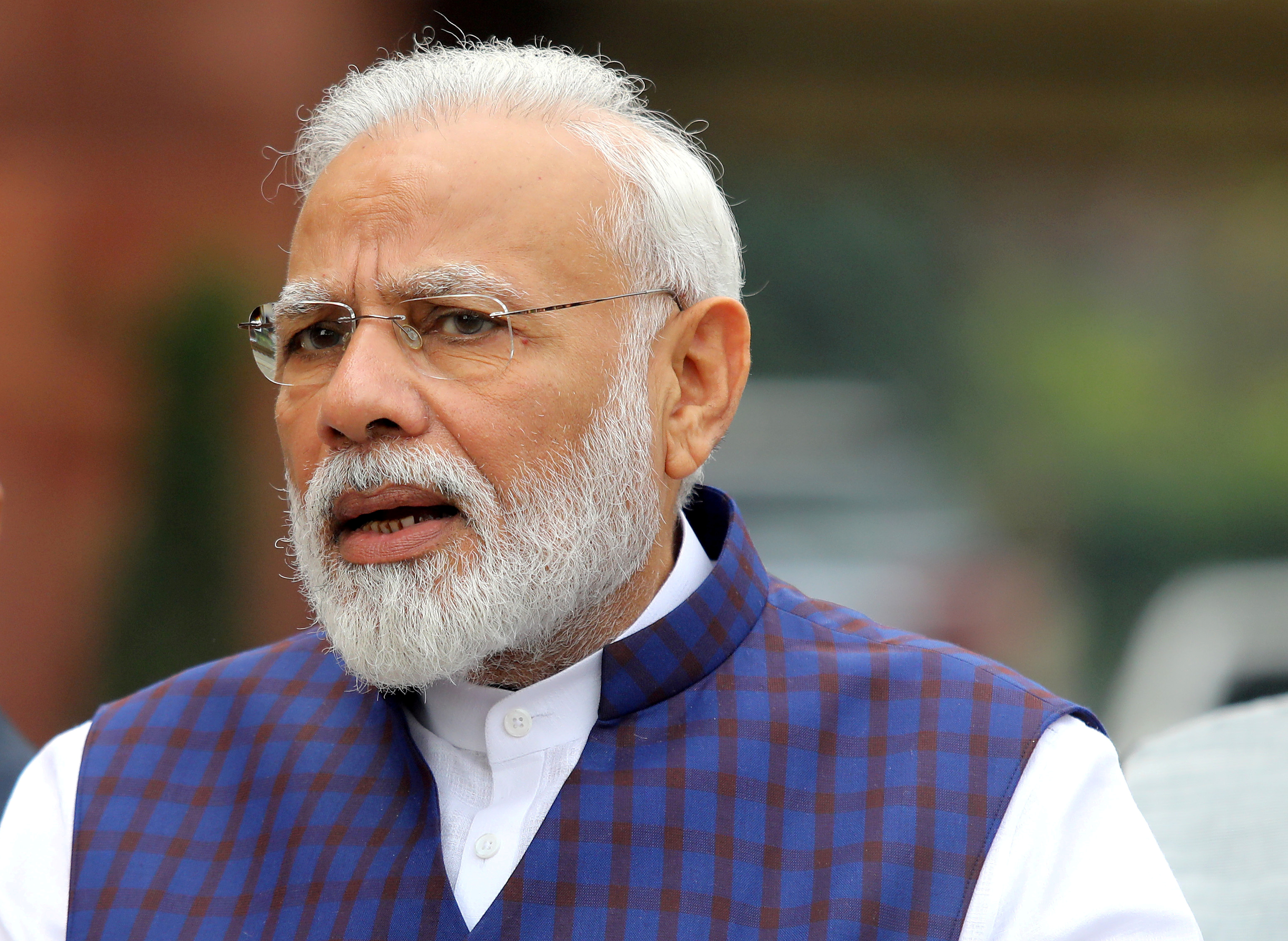 FILE PHOTO: FILE PHOTO: Indian Prime Minister Narendra Modi speaks to the media in New Delhi, India, November 18, 2019. REUTERS/Altaf Hussain/File Photo