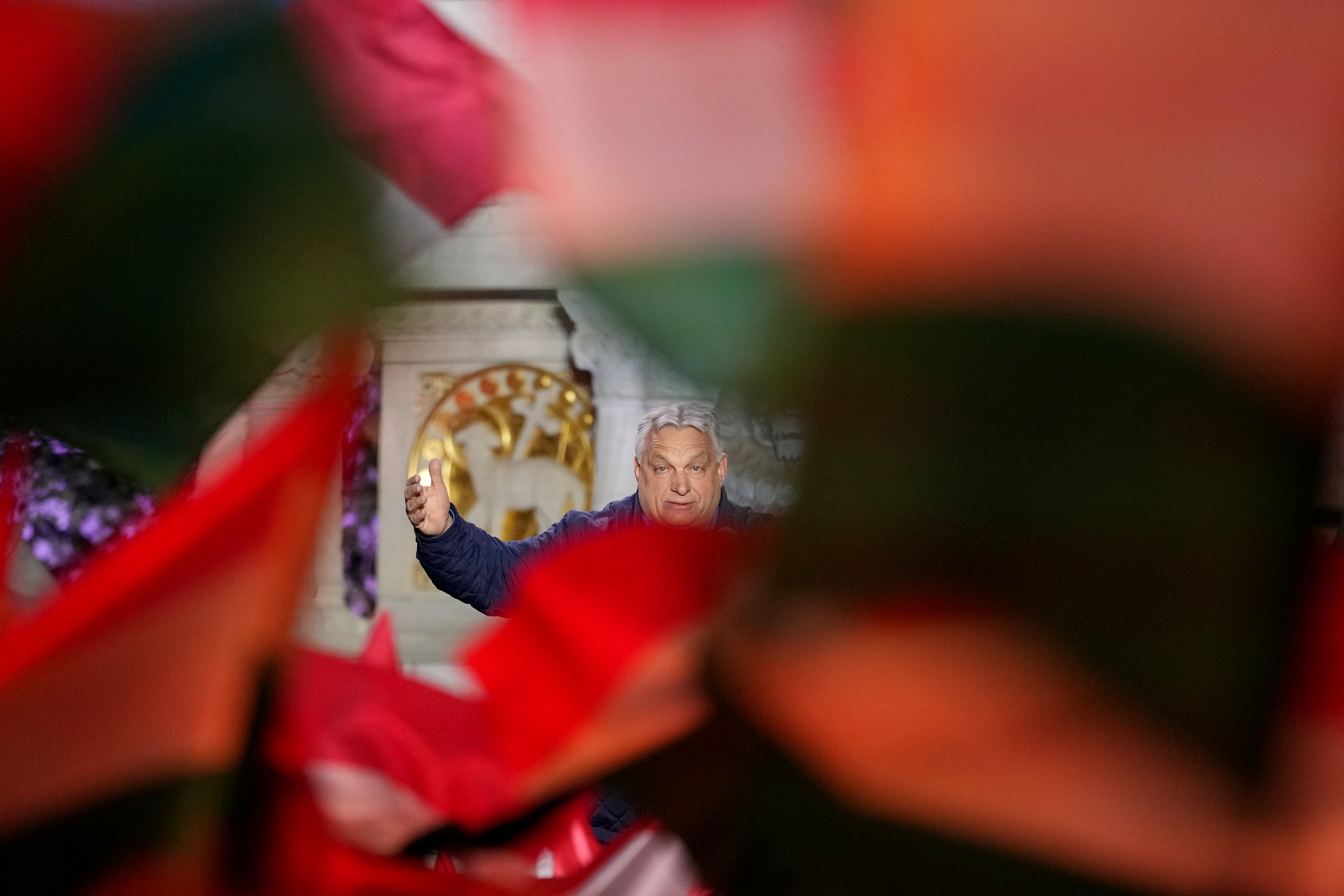 , Hungary's Prime Minister Viktor Orban addresses supporters during the electoral campaign closing rally of the governing Fidesz in Budapest, Hungary, Saturday, April 11, 2026. (AP Photo/Petr David Josek)
