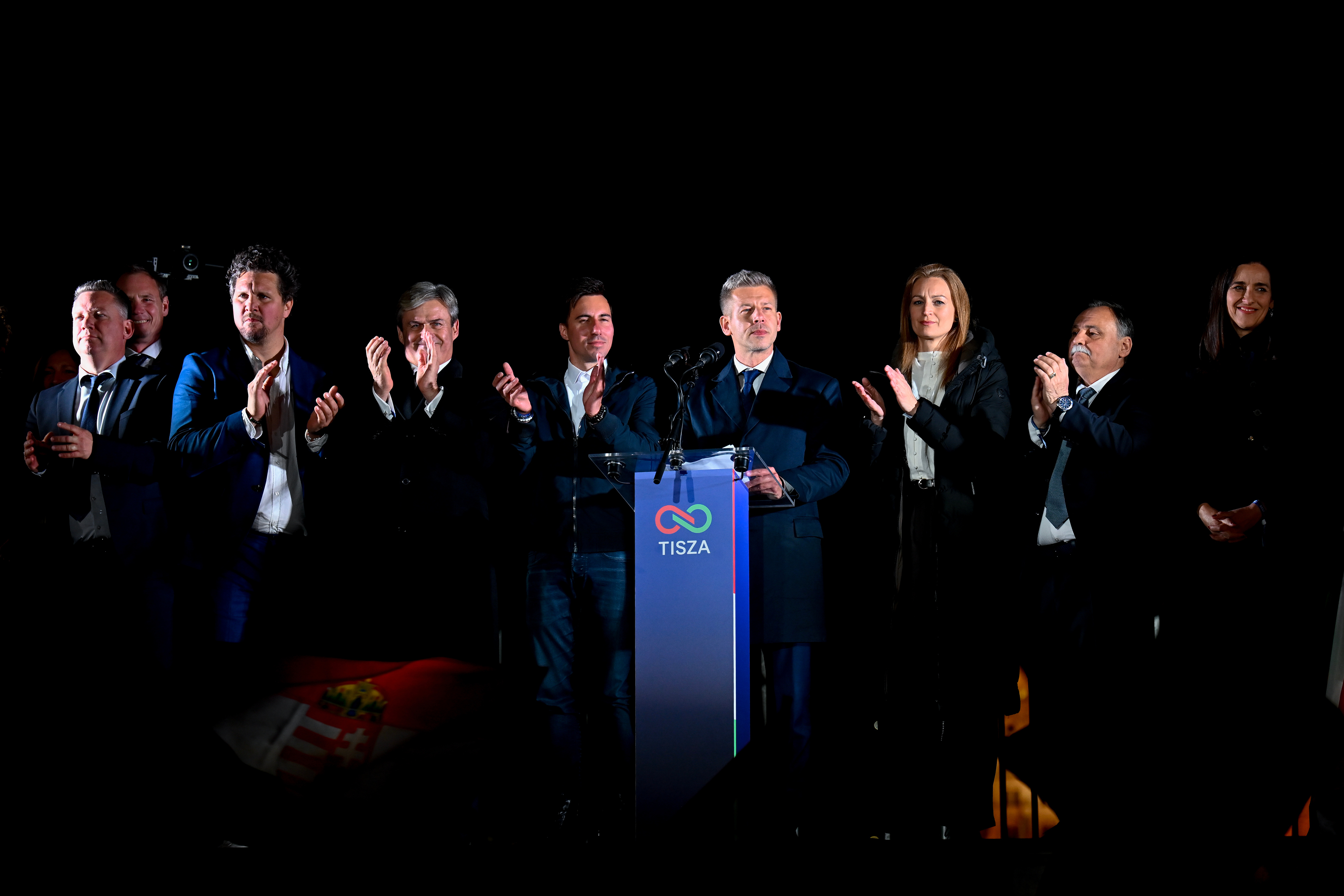 Peter Magyar, leader of the opposition Tisza party, speaks to his supporters following the announcement of the partial results of the parliamentary election, in Budapest, Hungary, Sunday, April 12, 2026. (AP Photo/Denes Erdos)