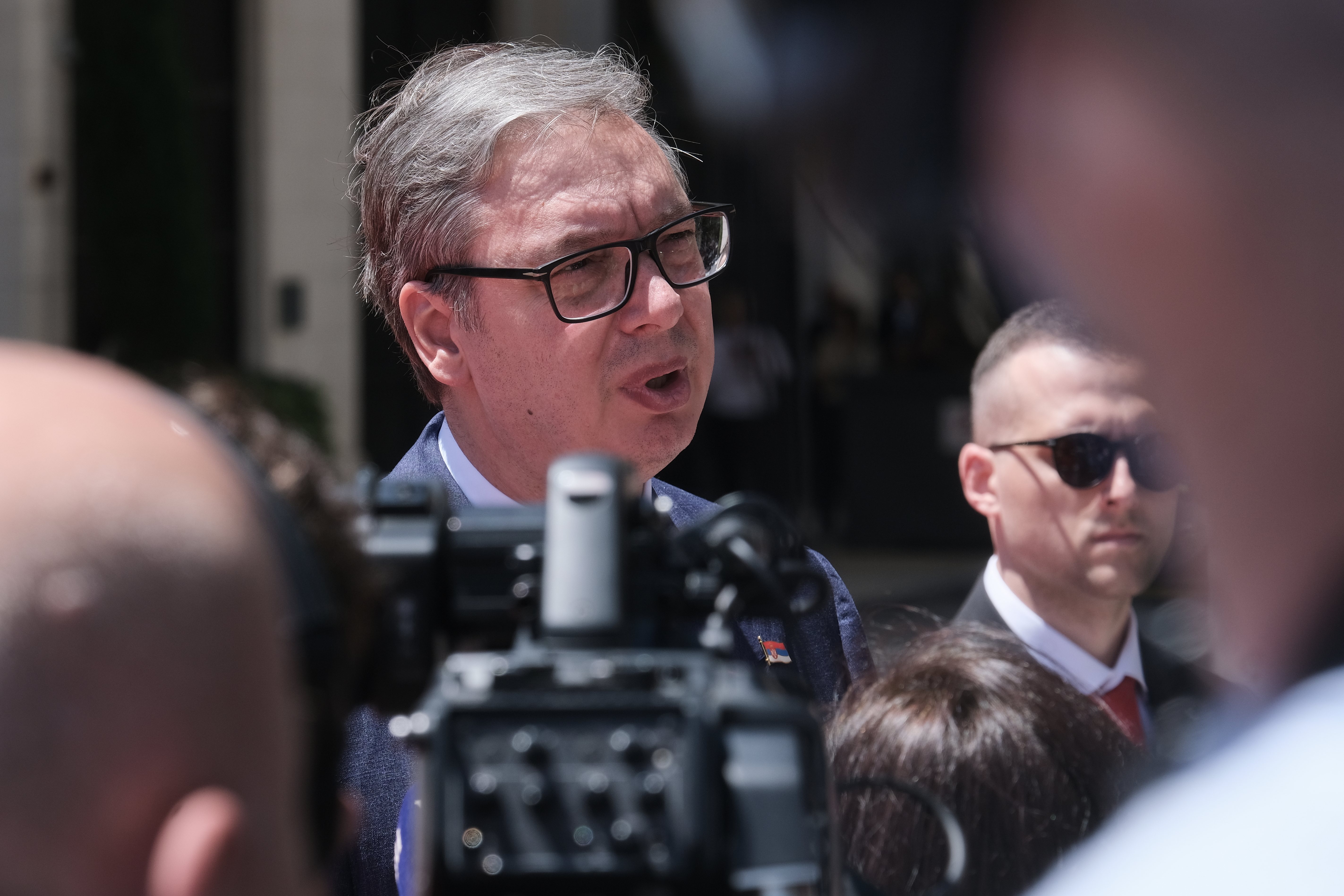 Serbian President Aleksandar Vucic speaks with the media as he arrives for the EU-Western Balkans summit in Tivat, Montenegro, Friday, June 5, 2026. (AP Photo/Risto Bozovic)