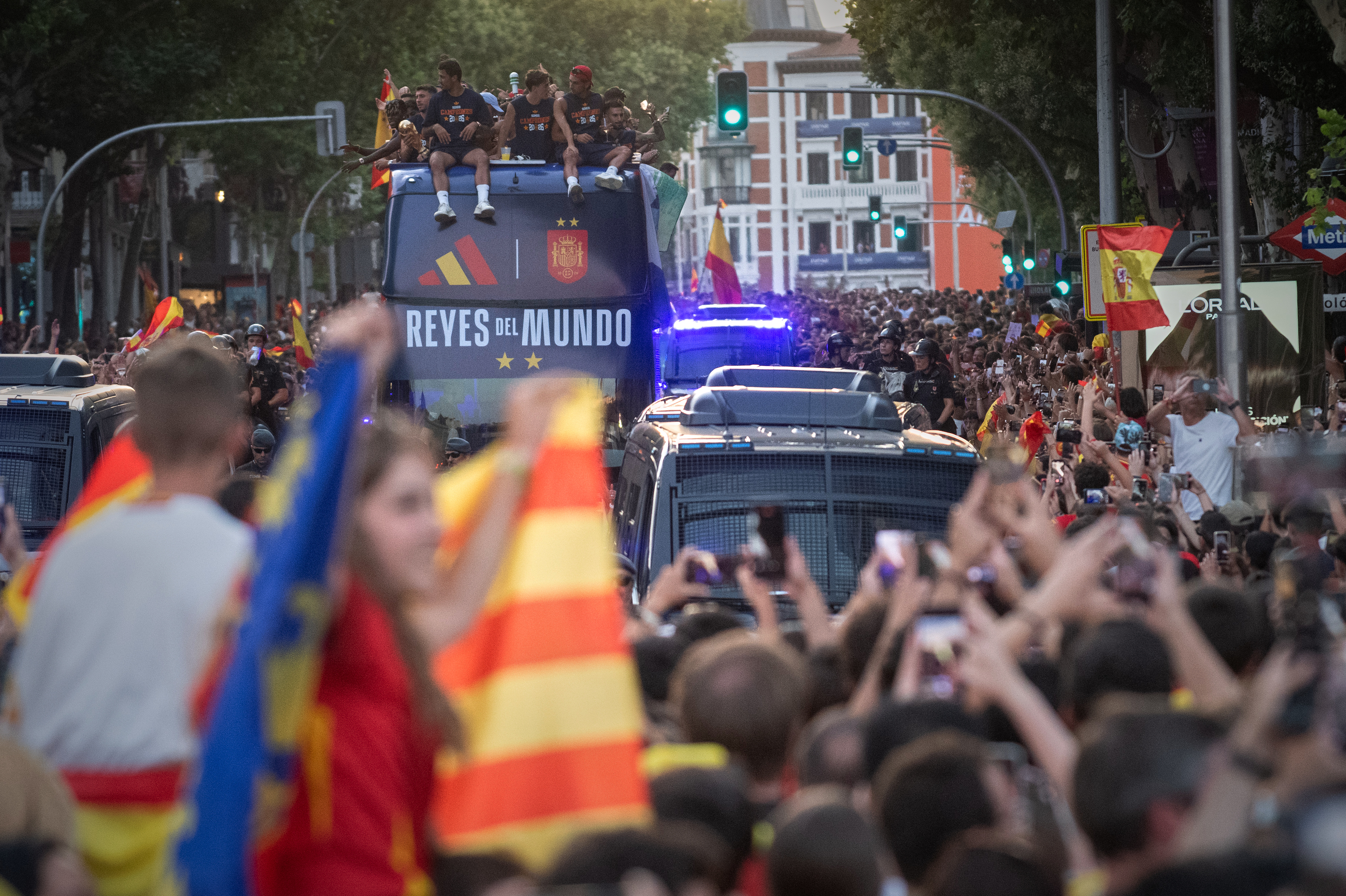 Players from Spain's national soccer team celebrate atop a bus as it travels through crowded streets in Madrid on Monday, July 20, 2026, after Spain defeated Argentina in the World Cup final. (Fernando Sanchez/Europa Press via AP)