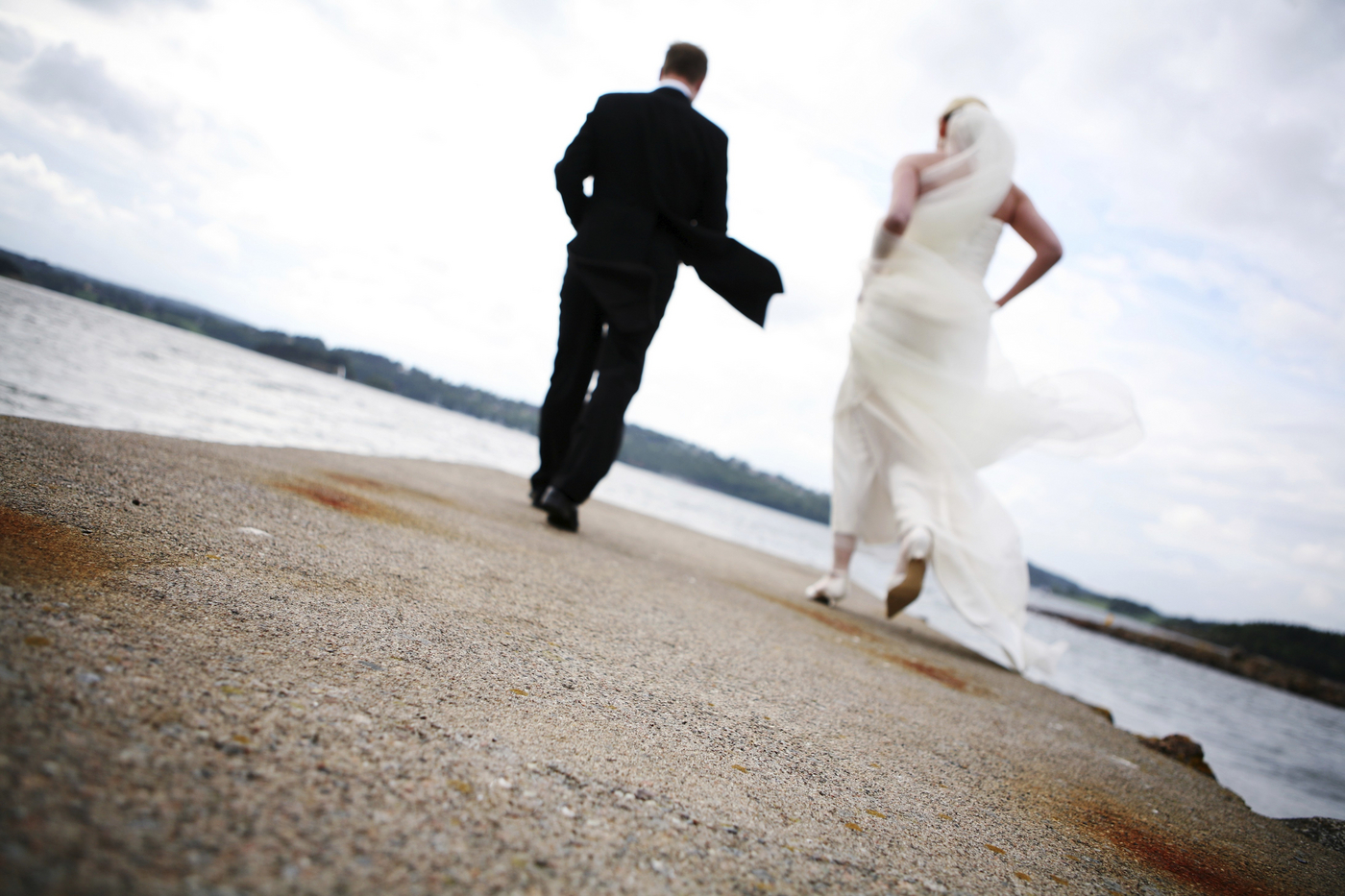 Bride and groom walking outdoors,Image: 1027074873, License: Royalty-free, Restrictions: , Model Release: yes, Credit line: Elisabeth Hoiberg / imageBROKER / Profimedia