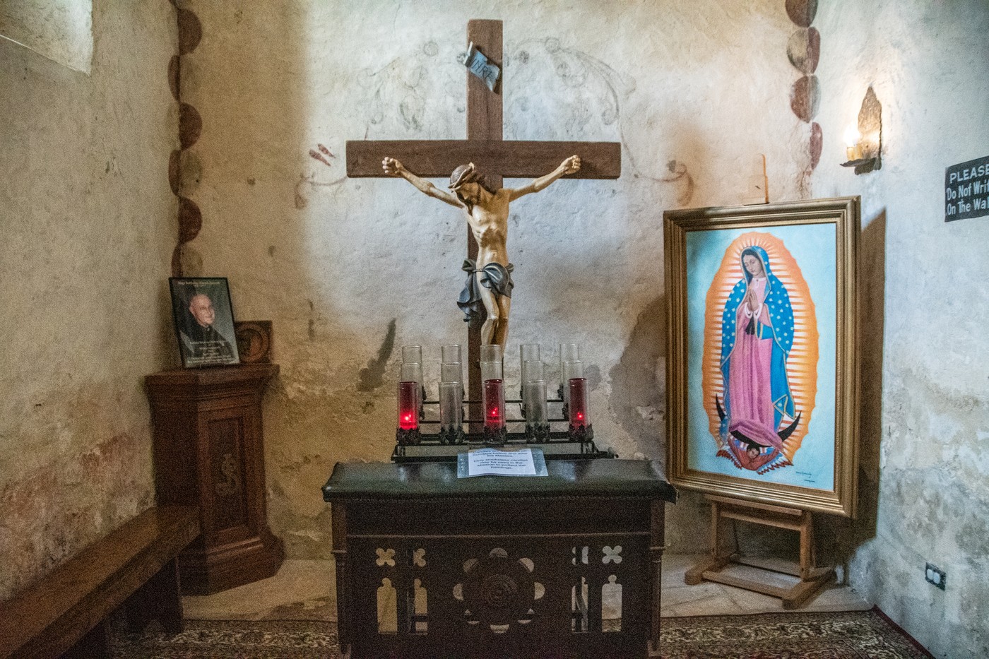 A small statue of Christ on the cross sits over an altar,Image: 954597524, License: Rights-managed, Restrictions: , Model Release: no, Credit line: Edwin Remsberg / VWPics / Profimedia