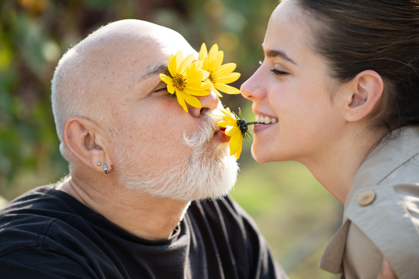 Funny Senior old man and daughter in summer. Lady with sugar daddy, close up portrait. Senior grandad and young woman in love. Daughter and father