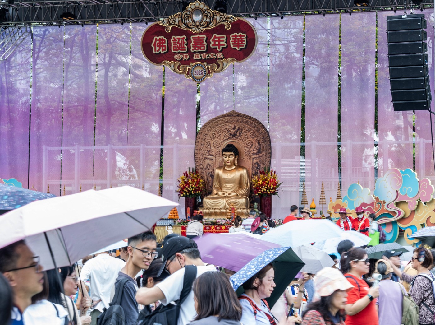 HONG KONG, CHINA - MAY 05: Believers queue up to bath the statue of buddha during 2025 Buddha s Birthday Carnival at Hon