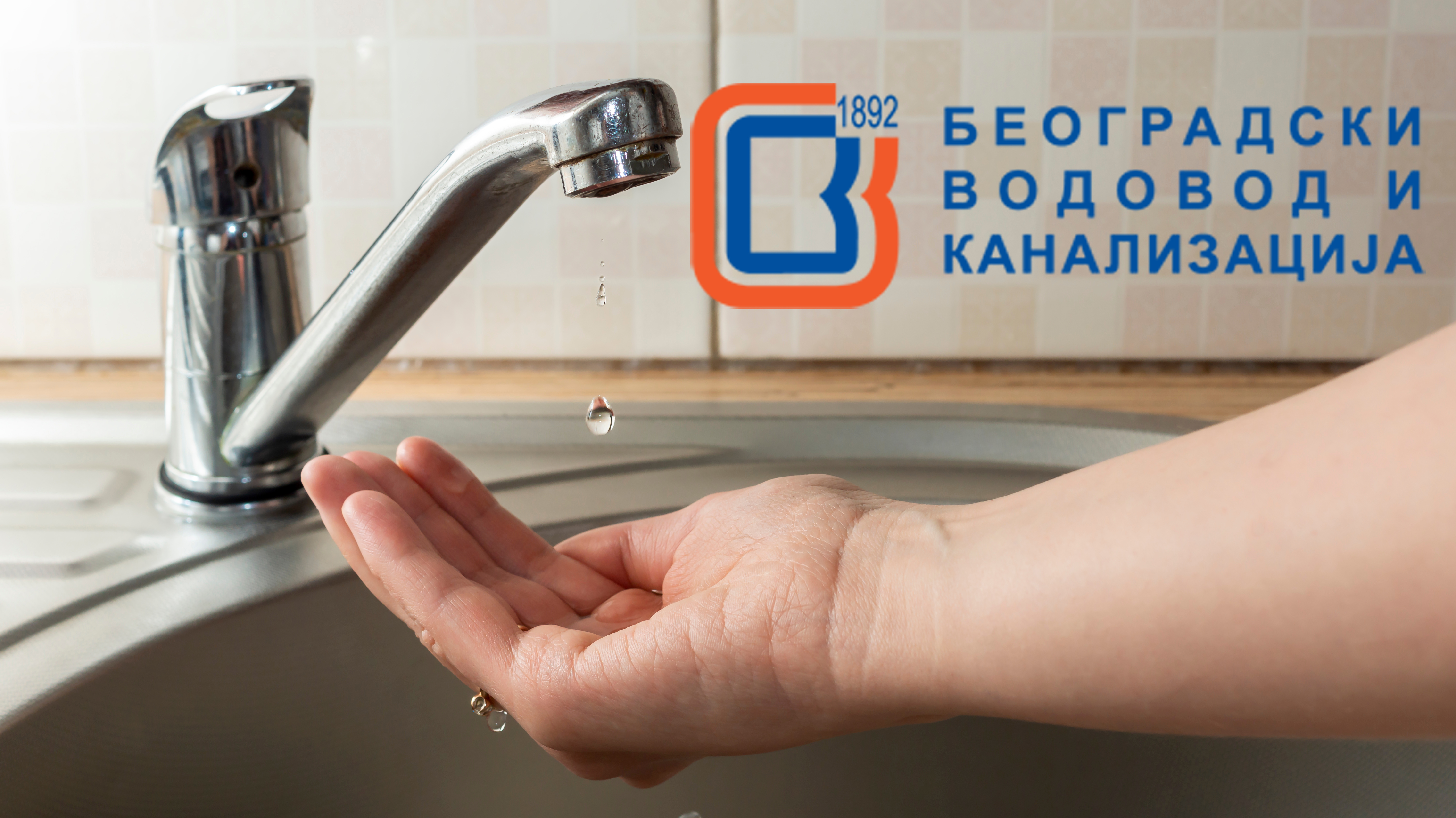 A,Drop,Of,Water,Drips,From,Faucet,In,Human,Palm