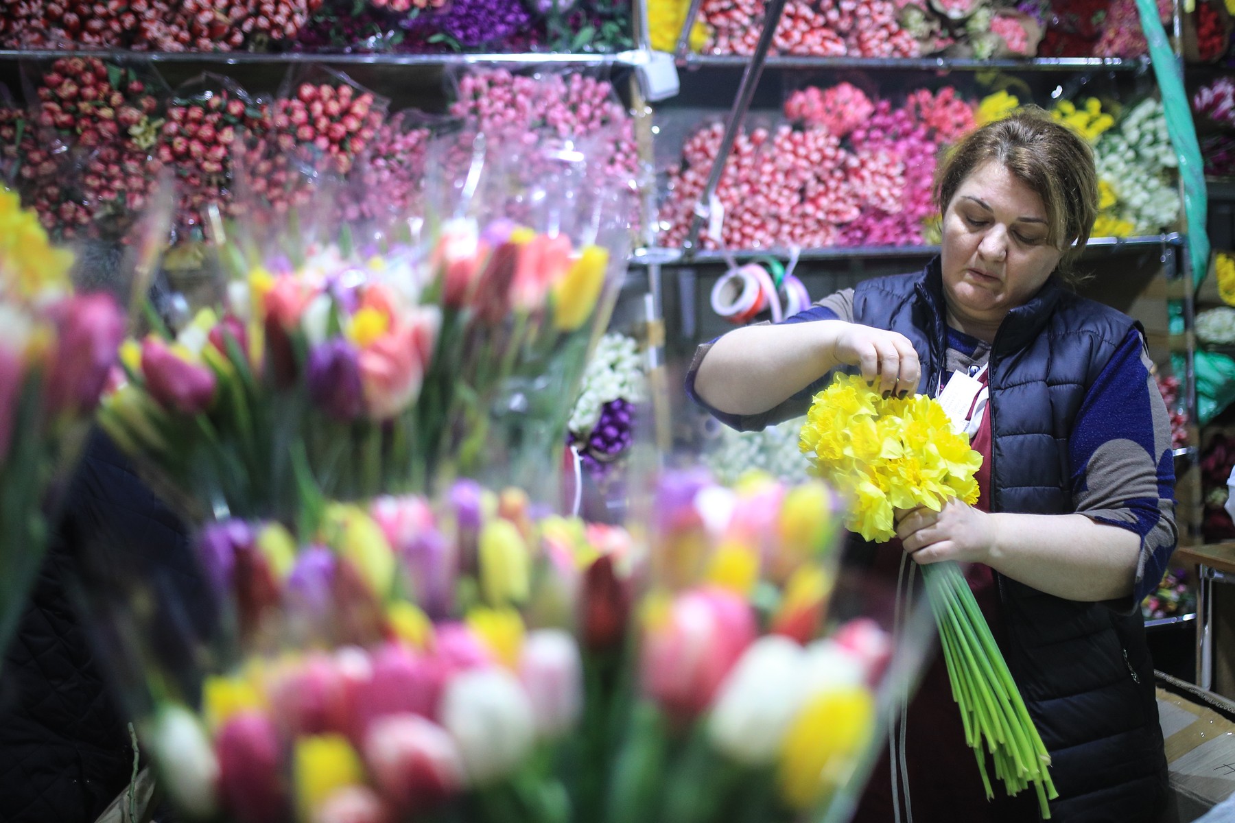 Selling flowers at Rizhsky market ahead of International Women's Day