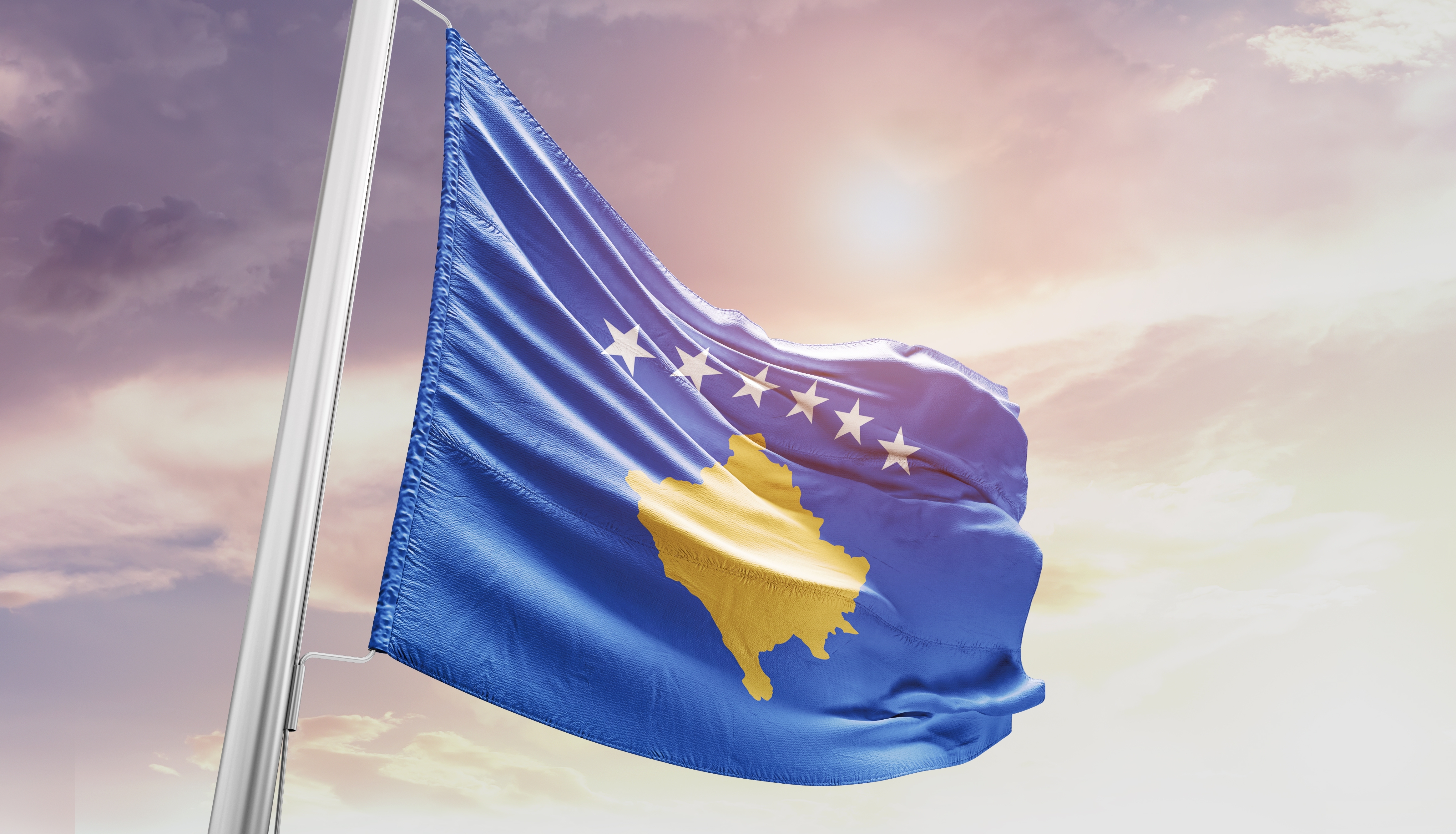 Kosovo,National,Flag,Waving,In,The,Sky.