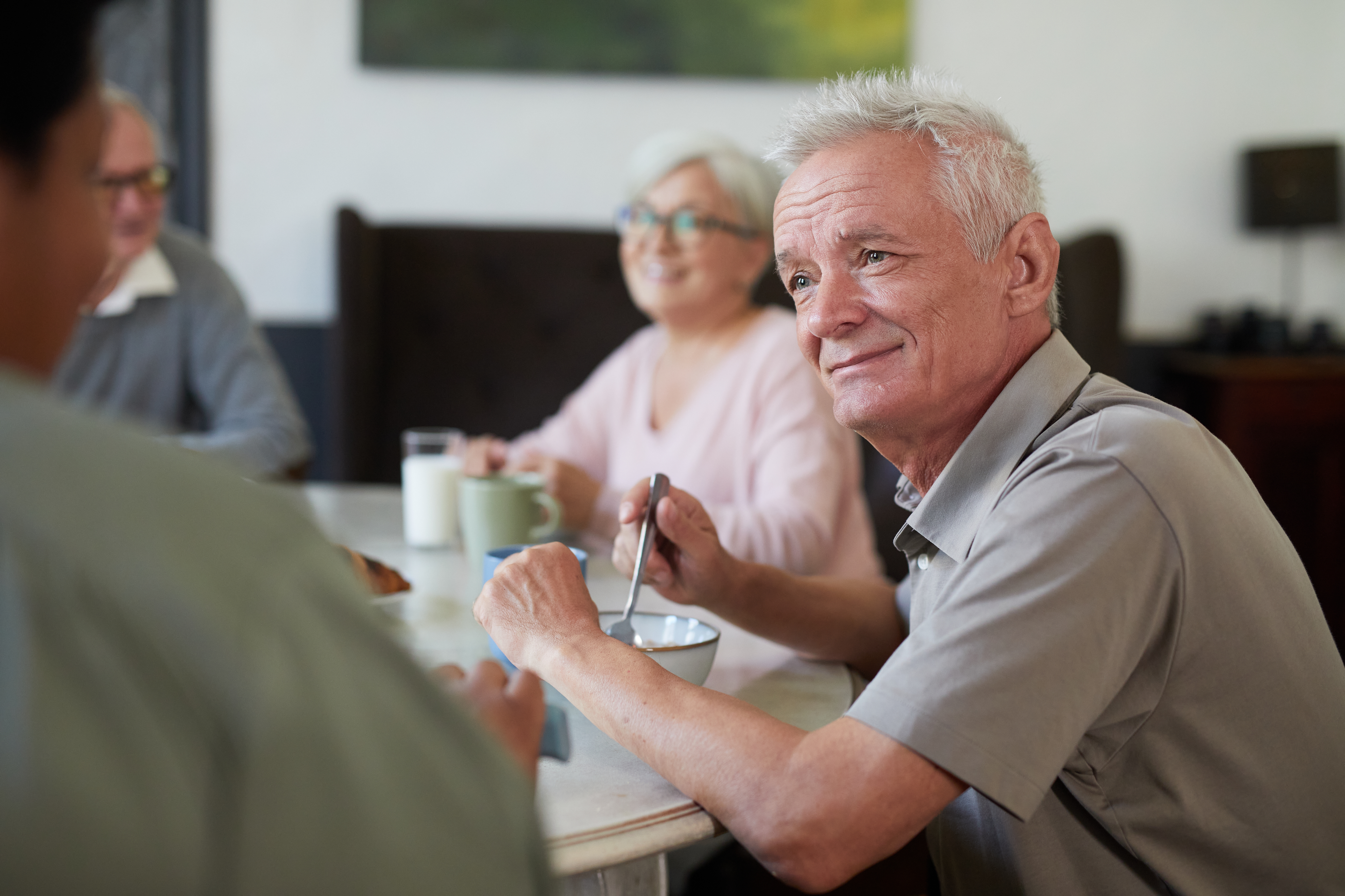 Portrait,Of,White,Haired,Senior,Man,Enjoying,Breakfast,In,Dining
