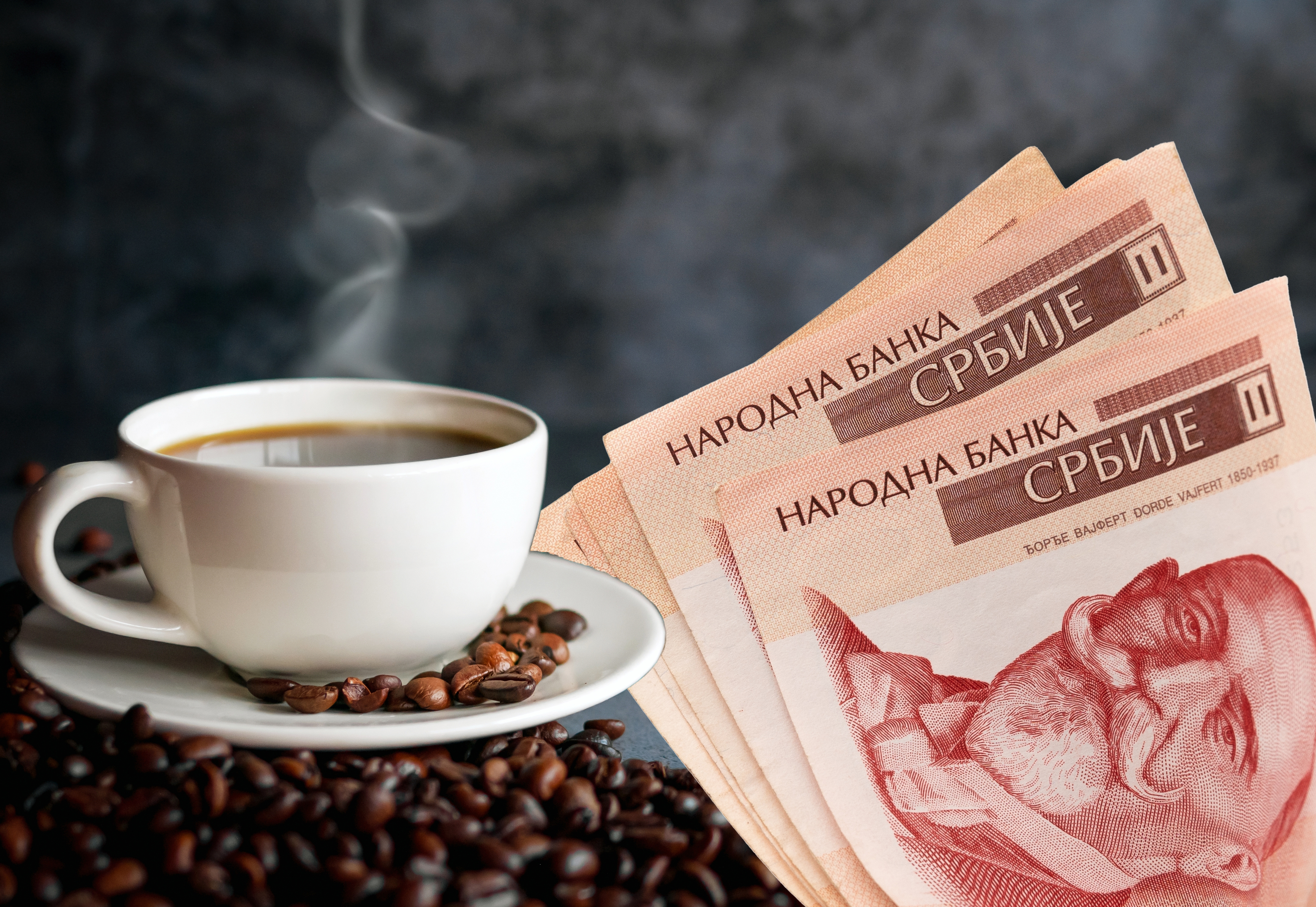 potrebna mi je slika za priču o povećanju cena kafe.. možda neka šolja kafe i neke pare.. Coffee cup and coffee beans on  gray background, Black coffee cup aromatic