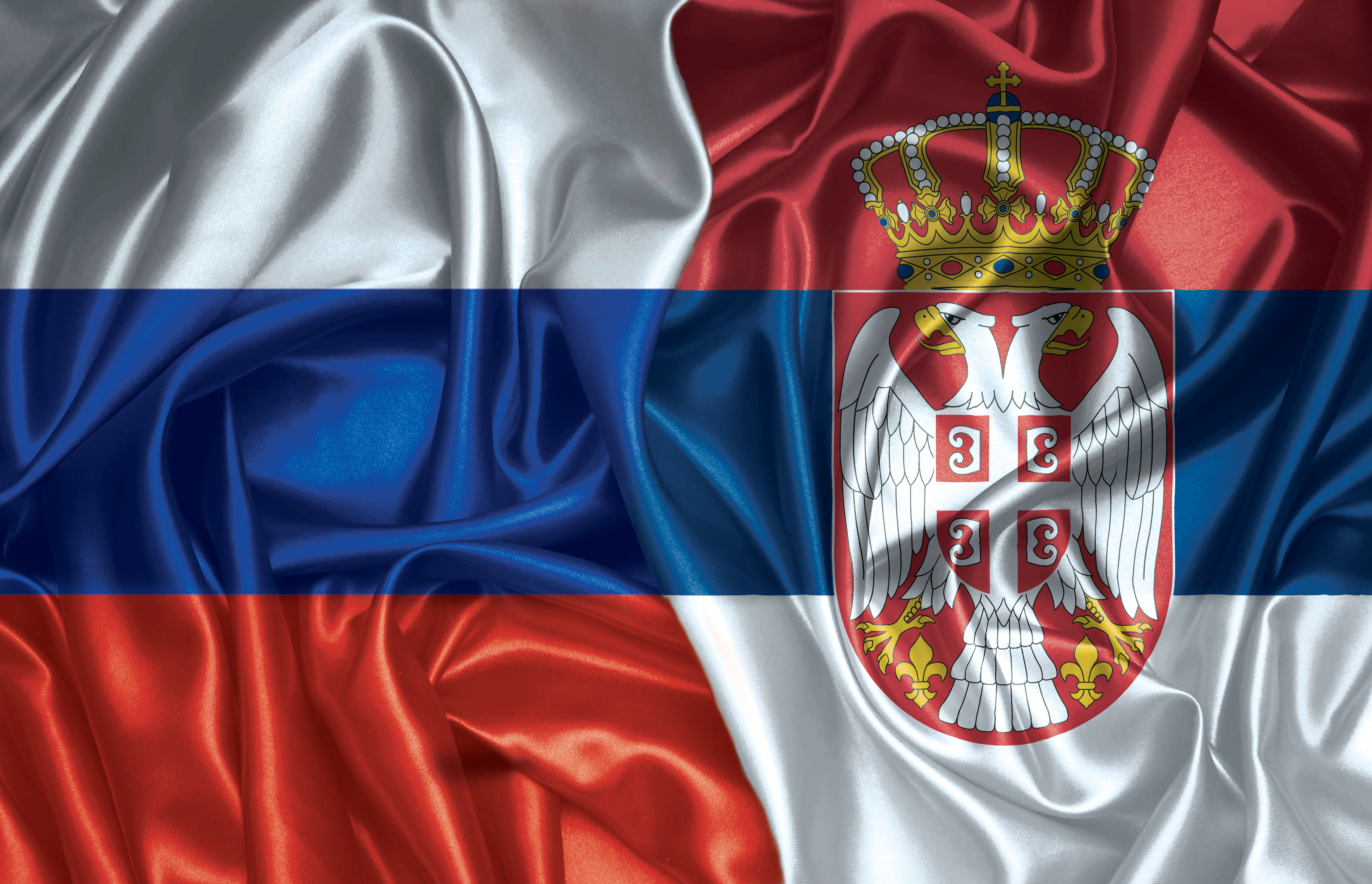 Russia,And,Serbia,Two,Folded,Silk,Flags,Together