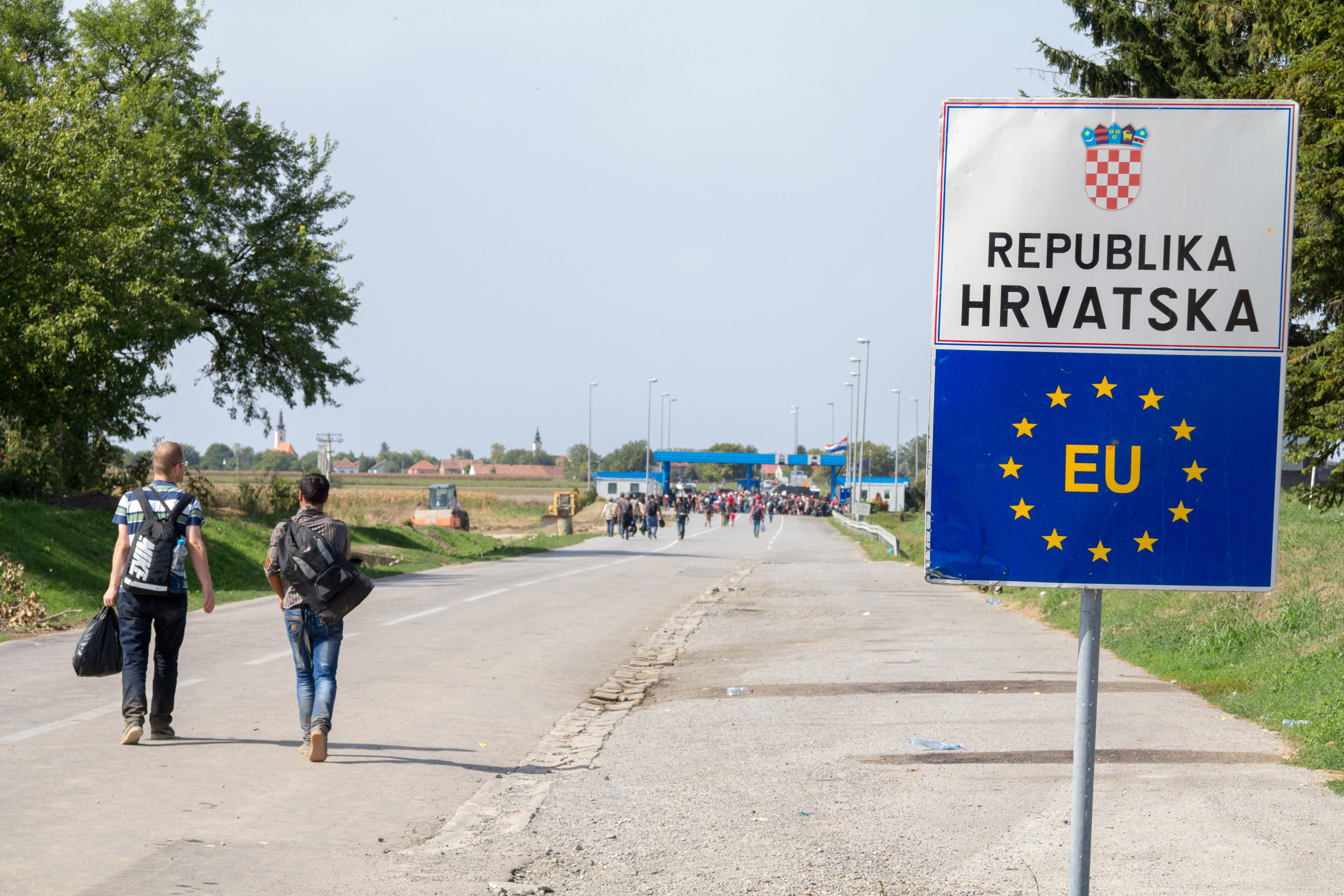 Tovarnik,,Croatia,-,September,19,,2015:,Refugees,Passing,In,Front