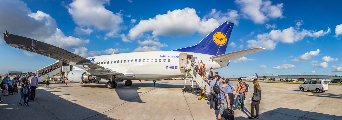 FRANKFURT, GERMANY - JULY 6, 2015: Boarding Lufthansa Jet airplane in Frankfurt airport. Lufthansa is the largest airline in Europe for overall passen