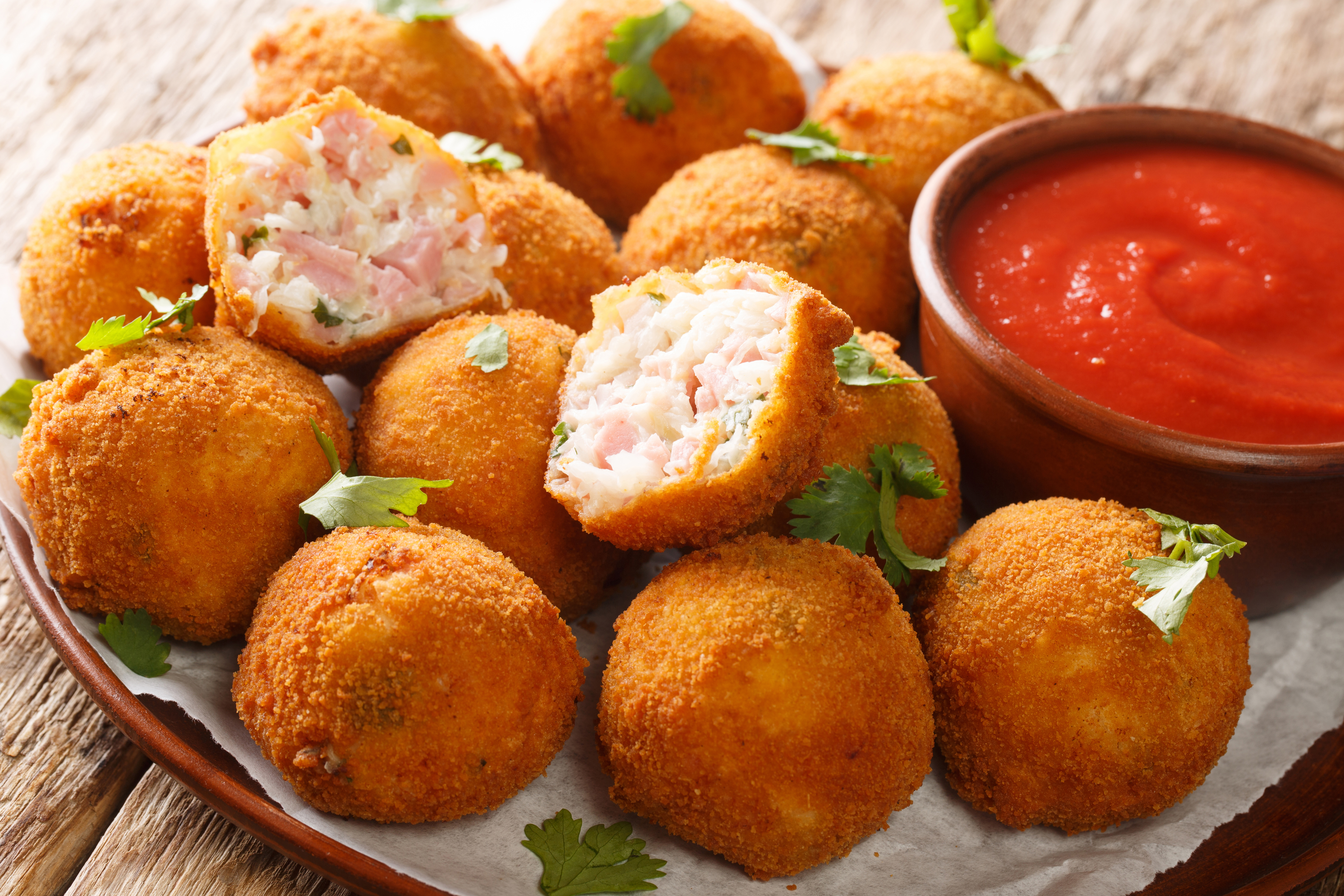 Hot,Fried,Sauerkraut,Balls,With,Ham,And,Cheese,Close-up,In