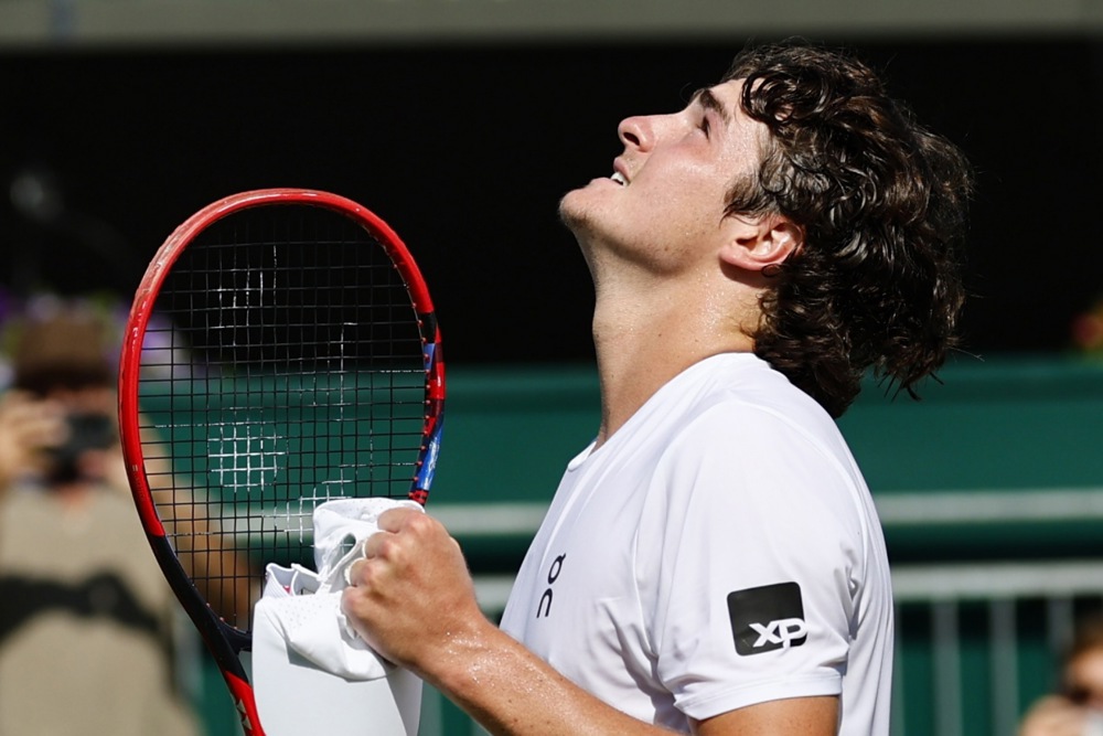 epa12210668 Joao Fonseca of Brazil celebrates after winning the Men's 2nd round match against Jenson Brooksby of the USA at the Wimbledon Championships, Wimbledon, Britain, 02 July 2025.  EPA/TOLGA AKMEN  EDITORIAL USE ONLY