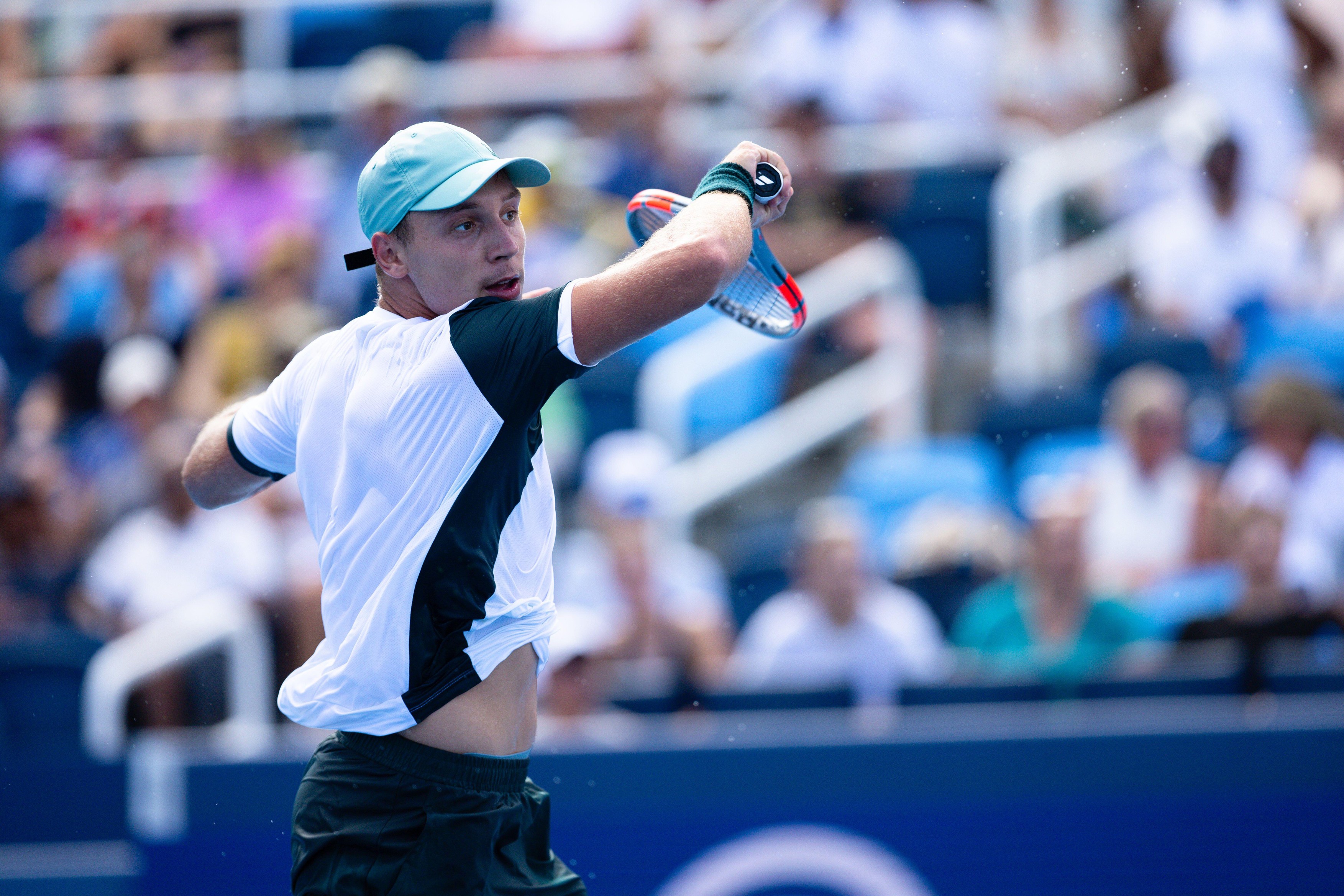 MASON, OHIO - AUGUST 12: Hamad Medjedovic of Serbia in action against Carlos Alcaraz of Spain during Day 6 of the Cincinnati Open at the Lindner Family Tennis Center on August 12, 2025 in Mason, Ohio. (Photo by Mauricio Paiz)