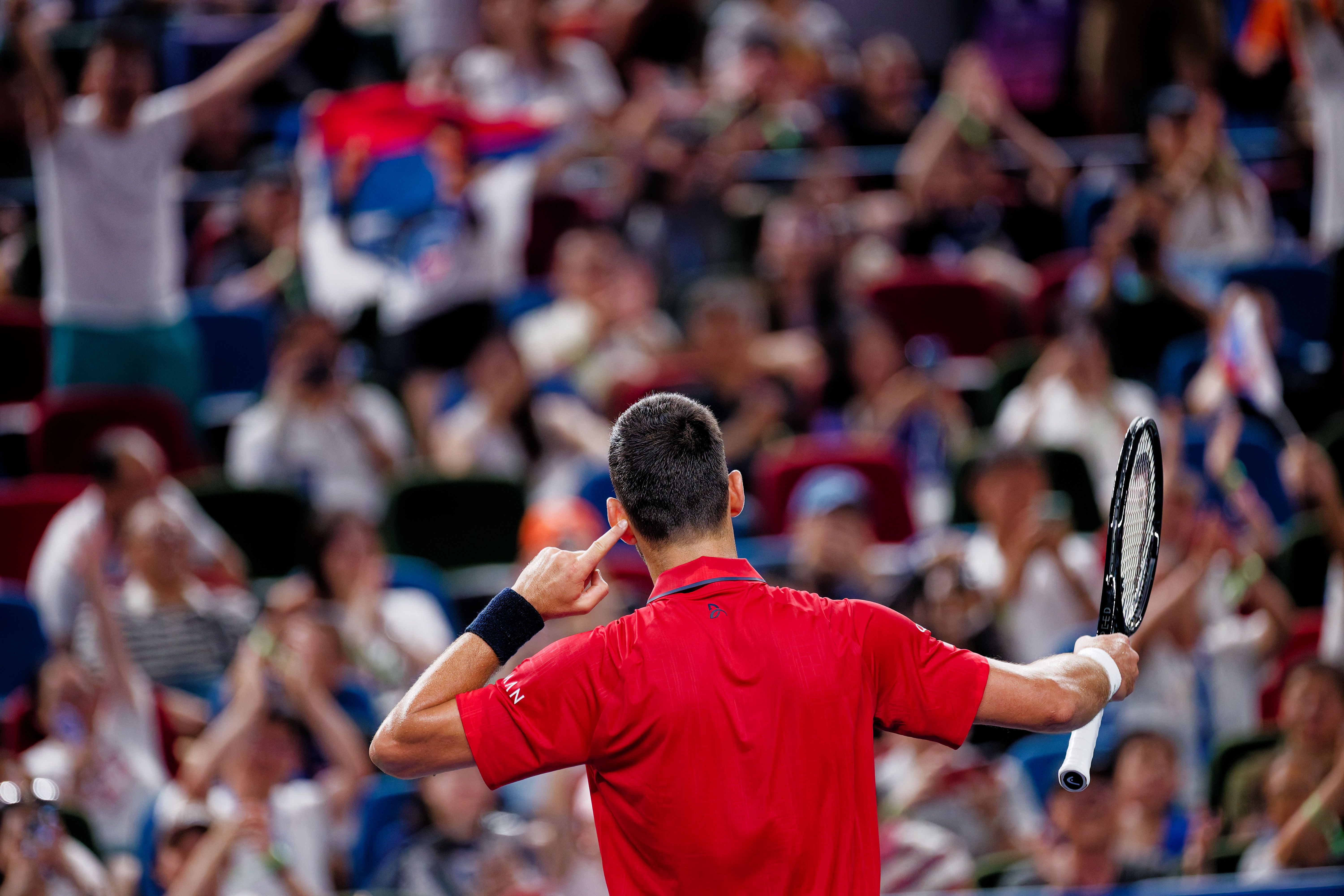 epa12432497 Novak Djokovic of Serbia reacts during his Men's Singles match against Yannick Hanfmann of Germany at the Shanghai Masters tennis tournament in Shanghai, China, 05 October 2025.  EPA/ALEX PLAVEVSKI