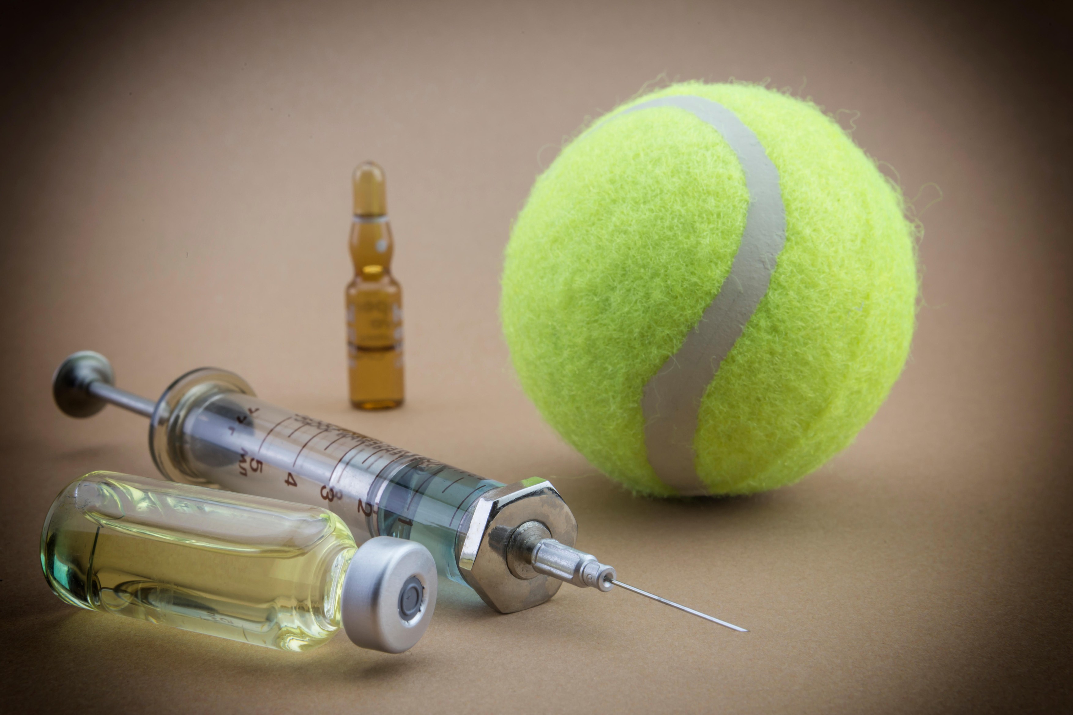 Tests for Research of urine along with a ball of tennis, concept of doping in the sport