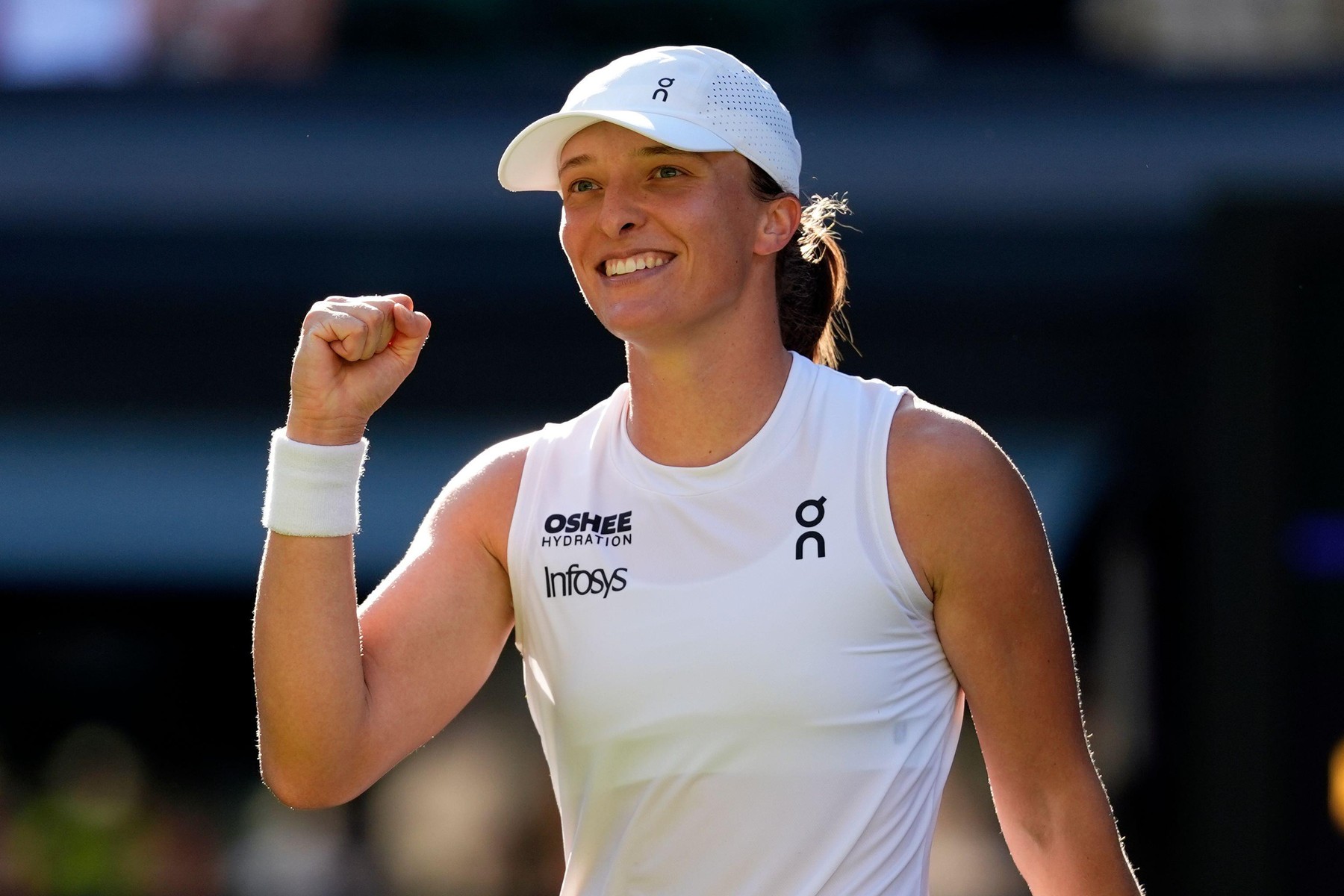 Iga Swiatek celebrates victory over Belinda Bencic following Ladies' Singles match on day eleven of the 2025 Wimbledon Championships at the All England Lawn Tennis and Croquet Club, London. Picture date: Thursday July 10, 2025.