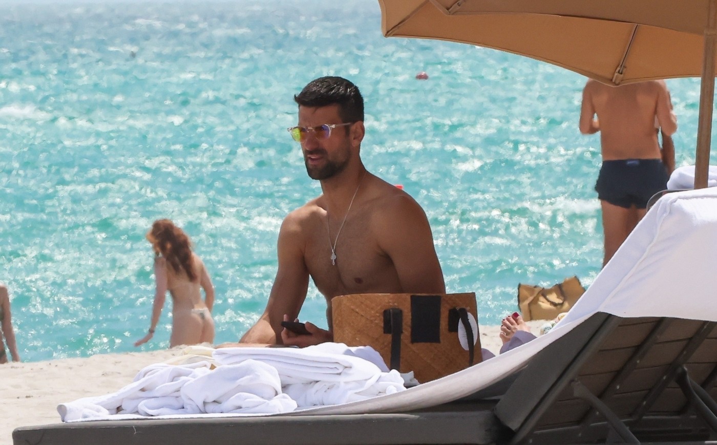 Novak Djokovic enjoys beach day with friends as he withdraws from Miami Open citing scheduling conflicts