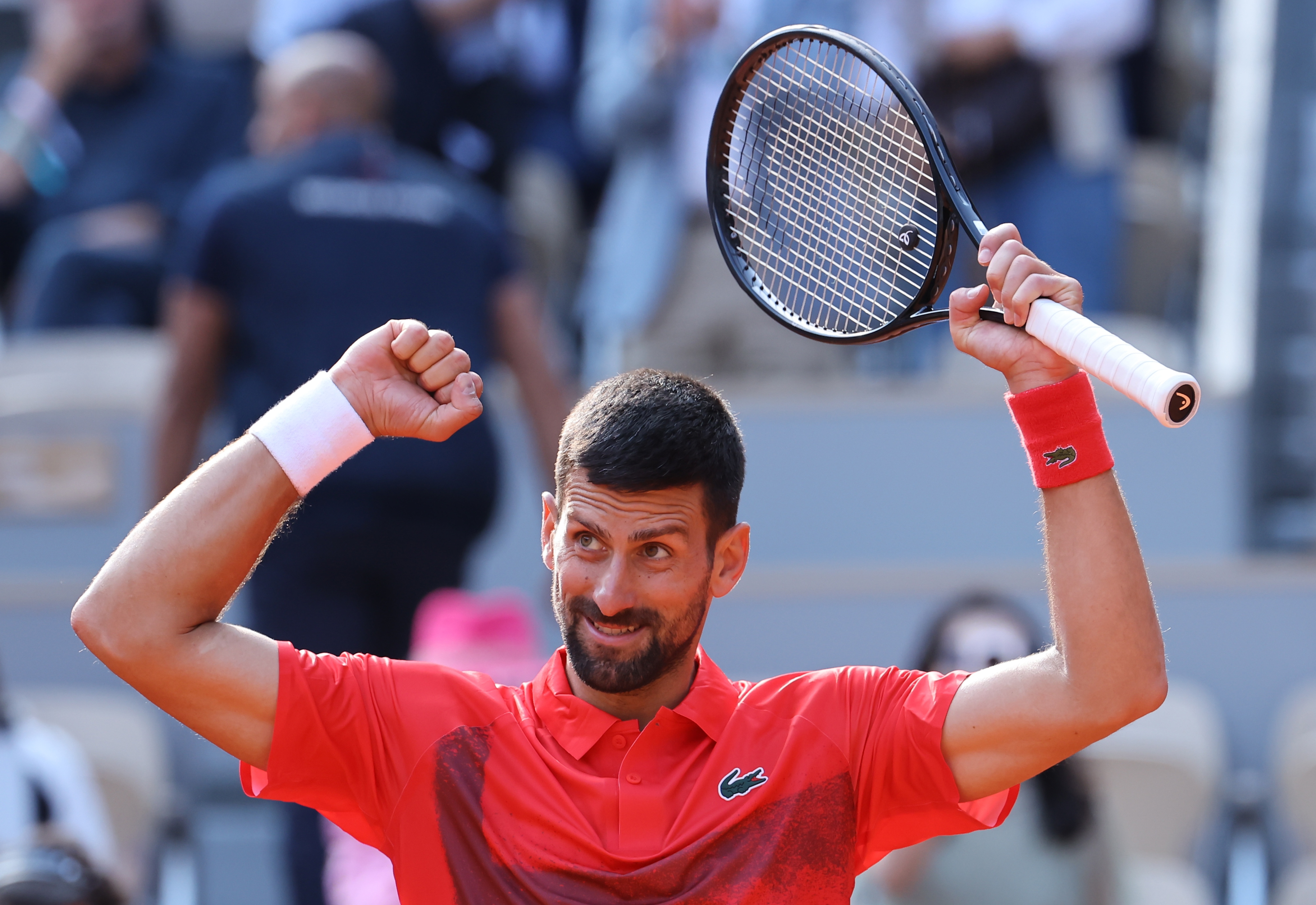 epa12151403 Novak Djokovic of Serbia celebrates winning his Men's 4th round match against Cameron Norrie of Britain at the French Open Grand Slam tennis tournament at Roland Garros in Paris, France, 02 June 2025.  EPA-EFE/CHRISTOPHE PETIT TESSON