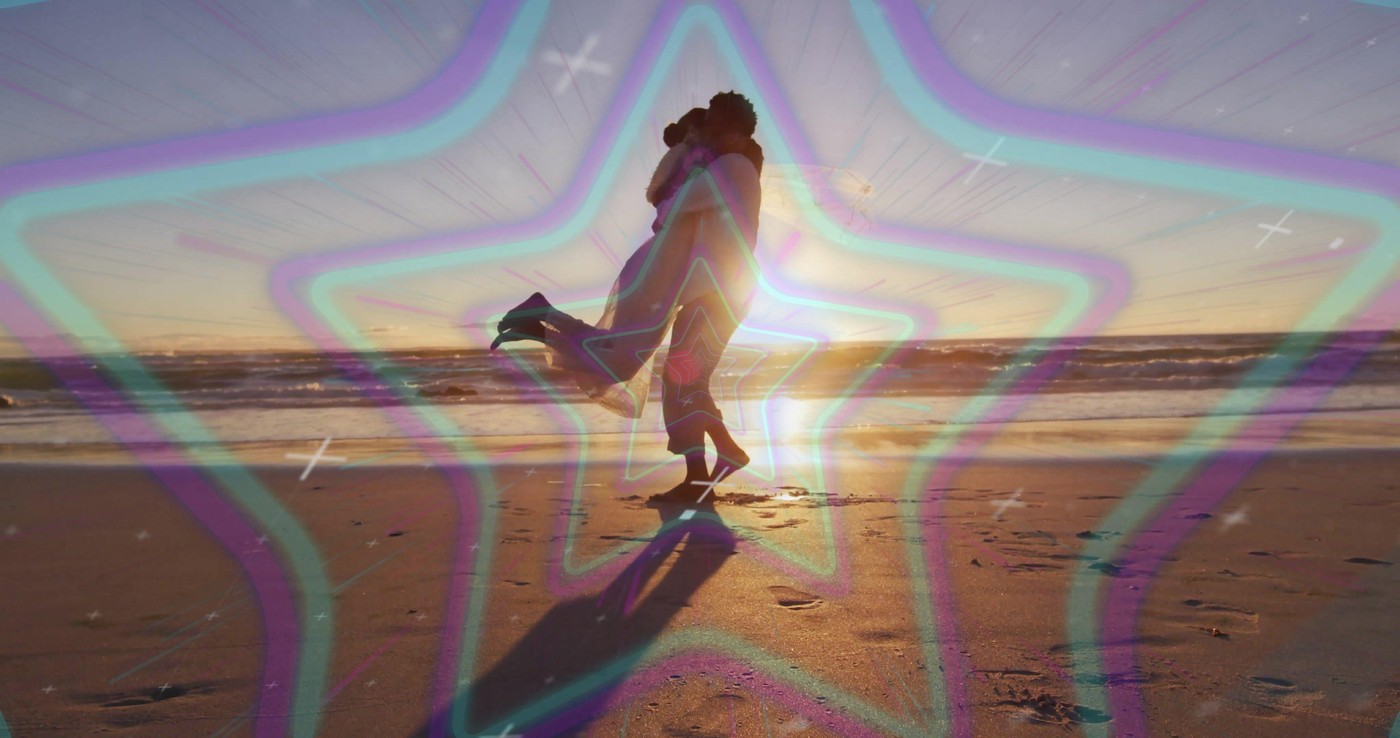 Embracing couple lifting woman off feet on sandy beach at sunset, with neon star overlay. Romance, affection, seaside, silhouette, serenity, dreamy, c